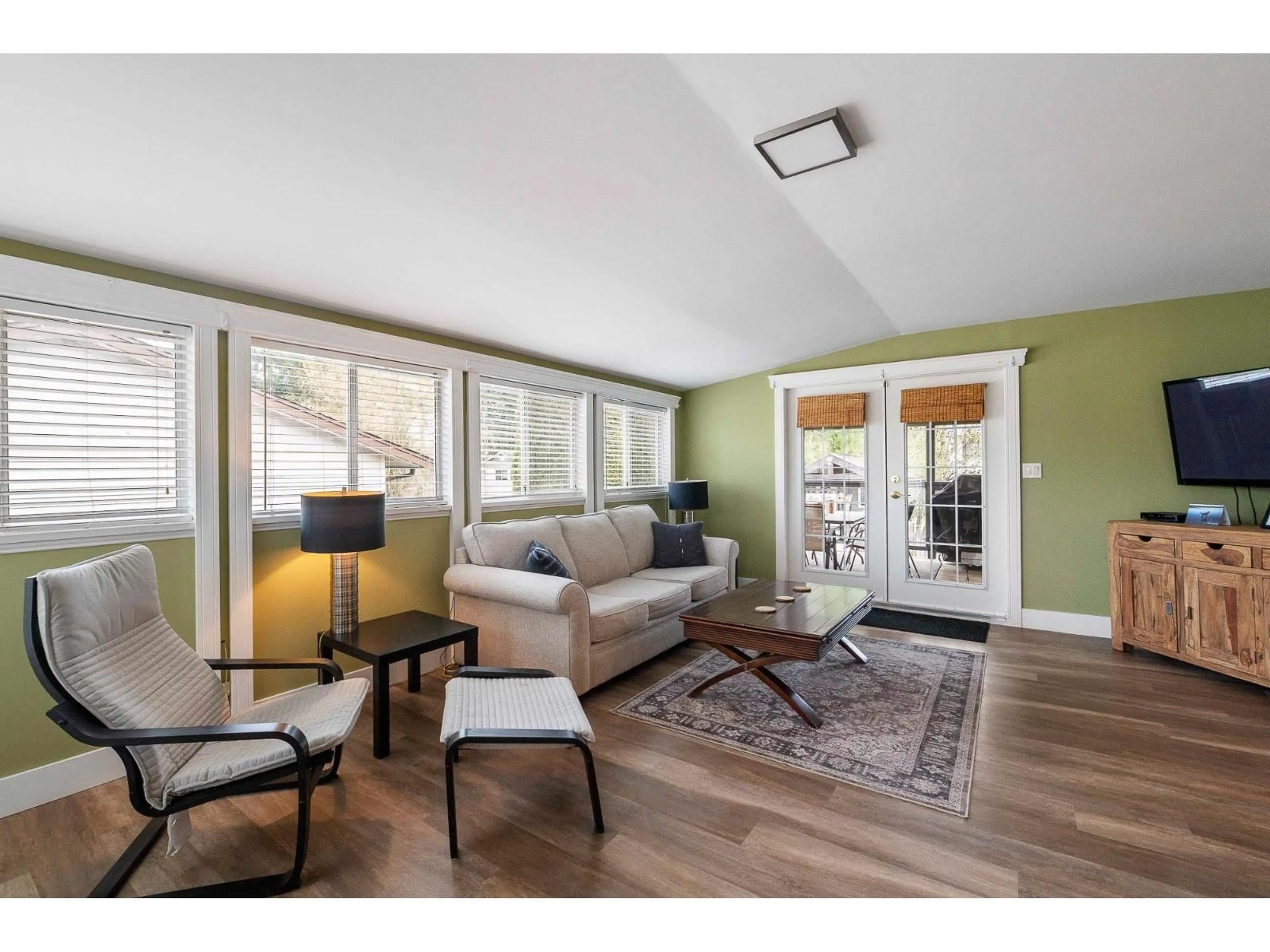 Living room with furniture, wood/laminate floor for 27157 28 AVENUE, Langley British Columbia V4W3A3