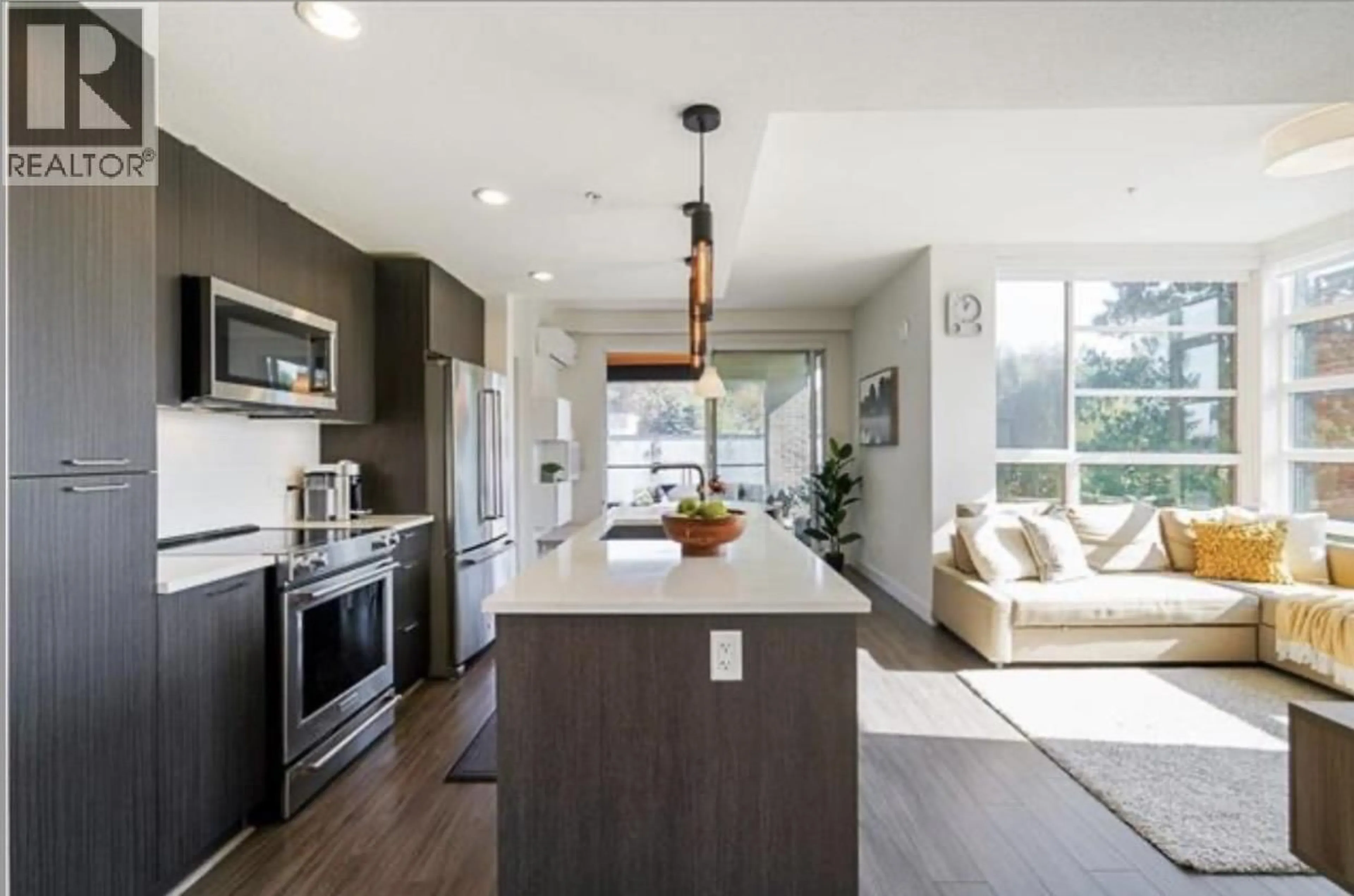 Open concept kitchen, unknown for 310 - 719 3RD STREET, North Vancouver British Columbia V7M0E7