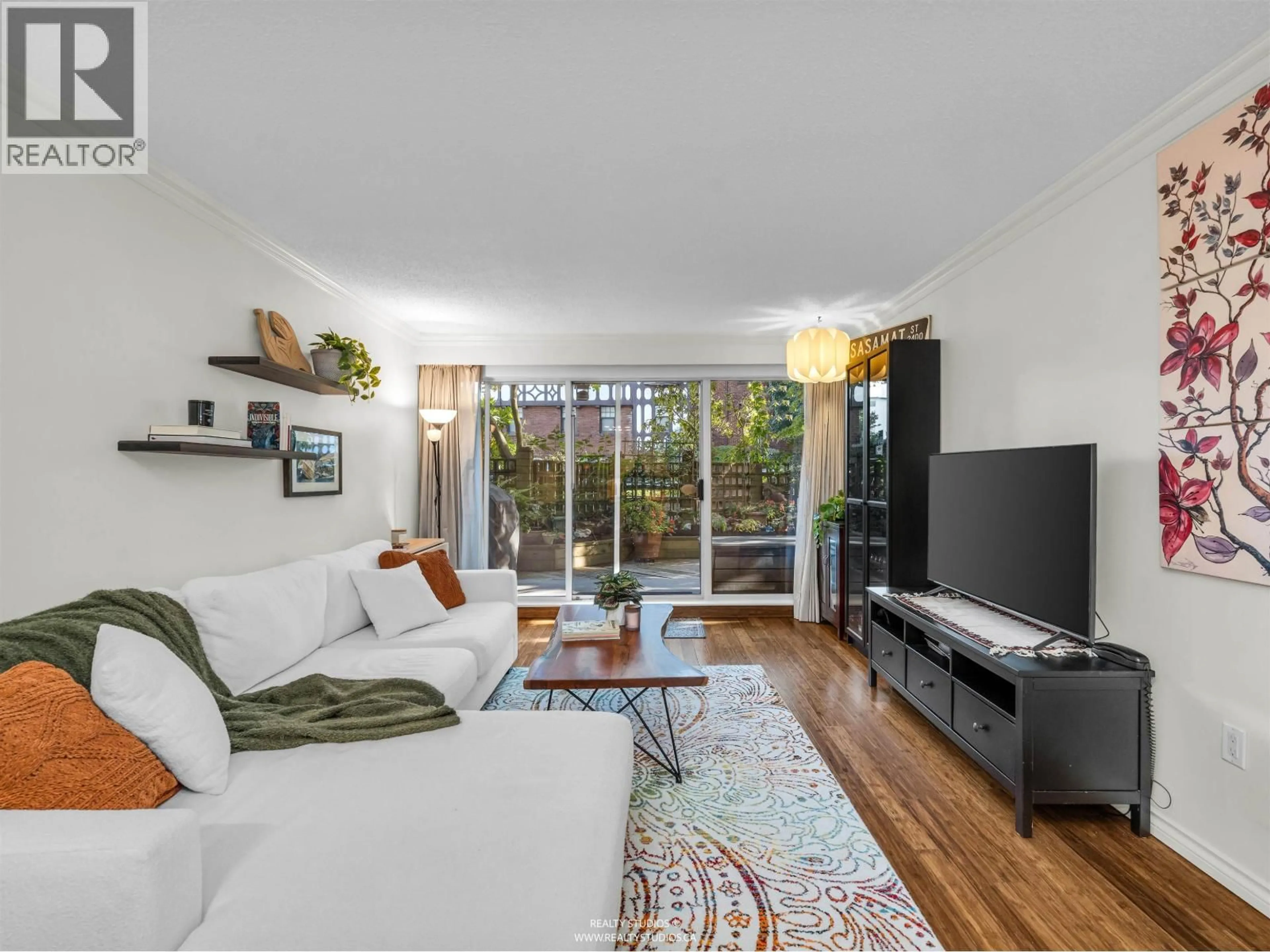 Living room with furniture, wood/laminate floor for 103 - 1412 14TH AVENUE, Vancouver British Columbia V6H1R3