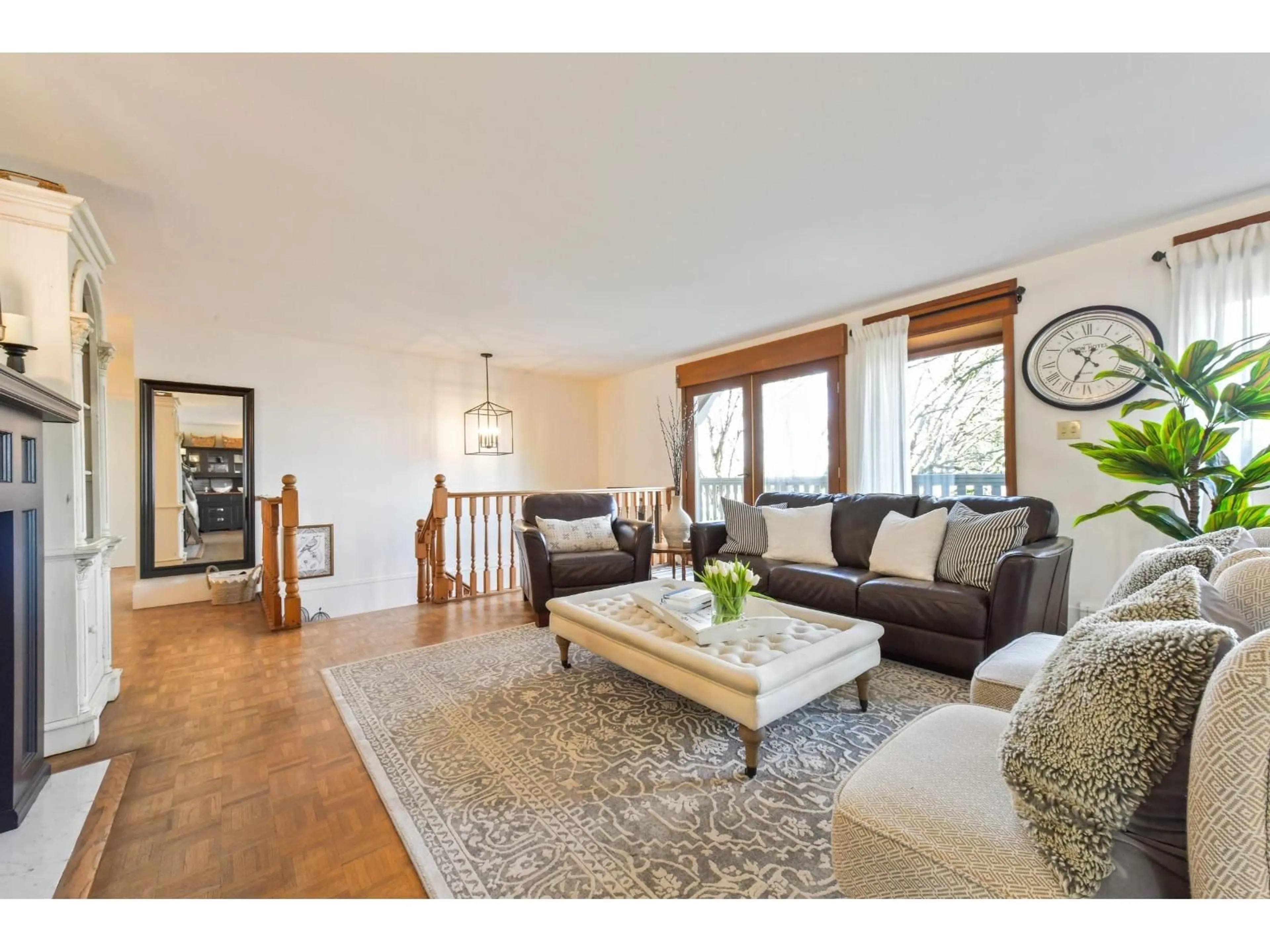 Living room with furniture, wood/laminate floor for 6096 180 STREET, Surrey British Columbia V3S5W5