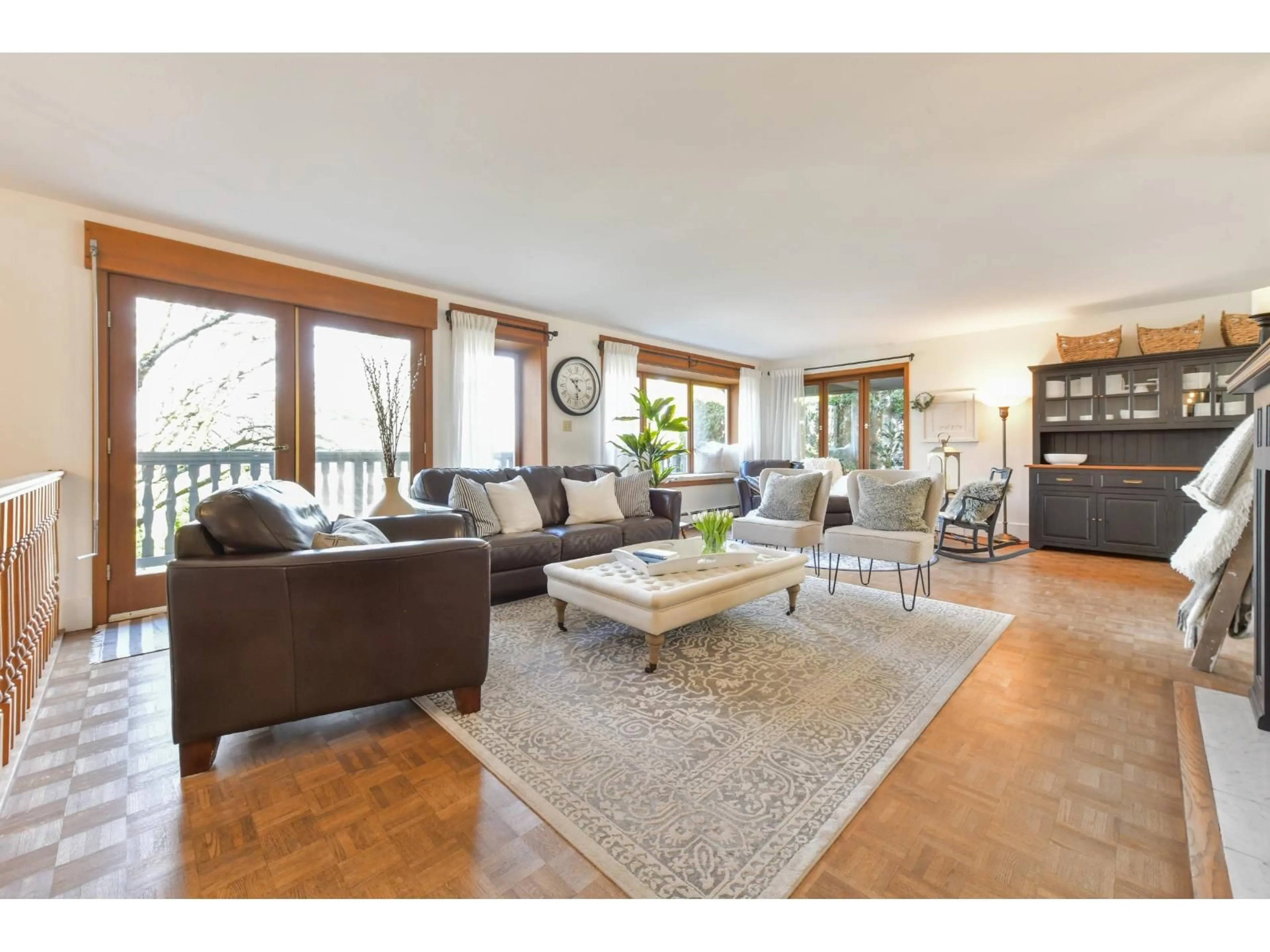 Living room with furniture, wood/laminate floor for 6096 180 STREET, Surrey British Columbia V3S5W5