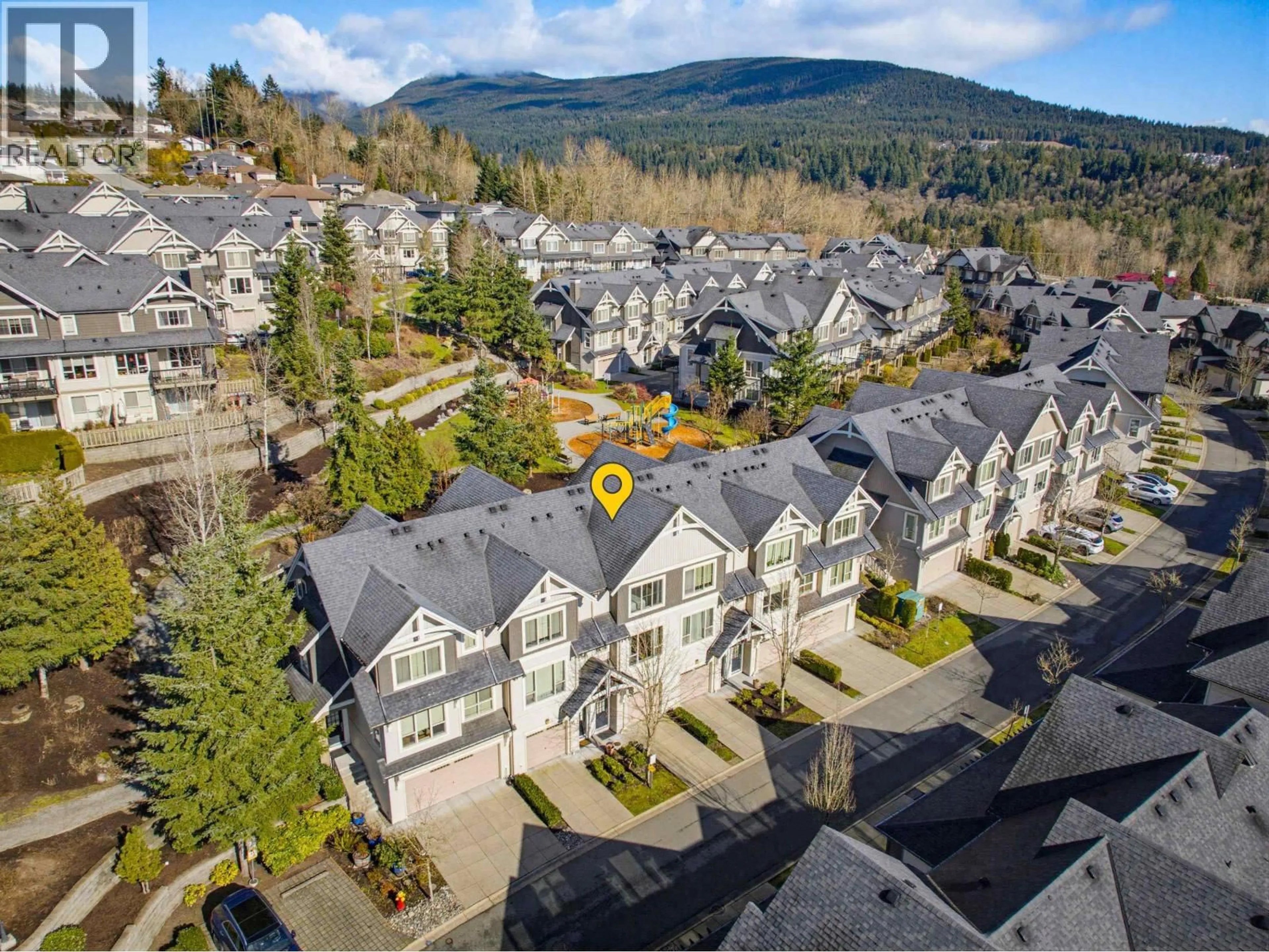 A pic from outside/outdoor area/front of a property/back of a property/a pic from drone, mountain view for 230 - 3105 DAYANEE SPRINGS BOULEVARD, Coquitlam British Columbia V3E0C2