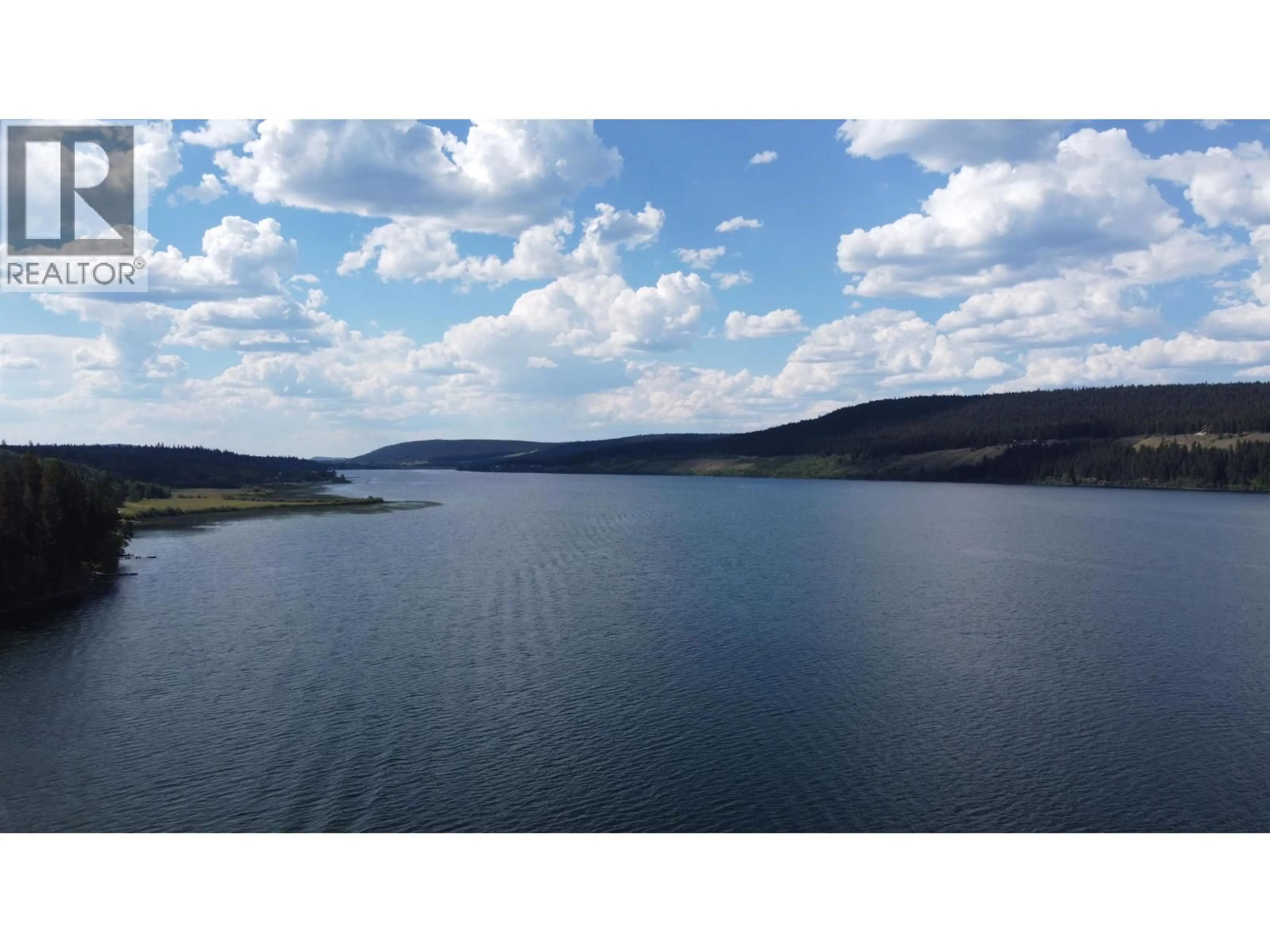 A pic from outside/outdoor area/front of a property/back of a property/a pic from drone, water/lake/river/ocean view for 6301 MULLIGAN ROAD, 100 Mile House British Columbia V0K2E3