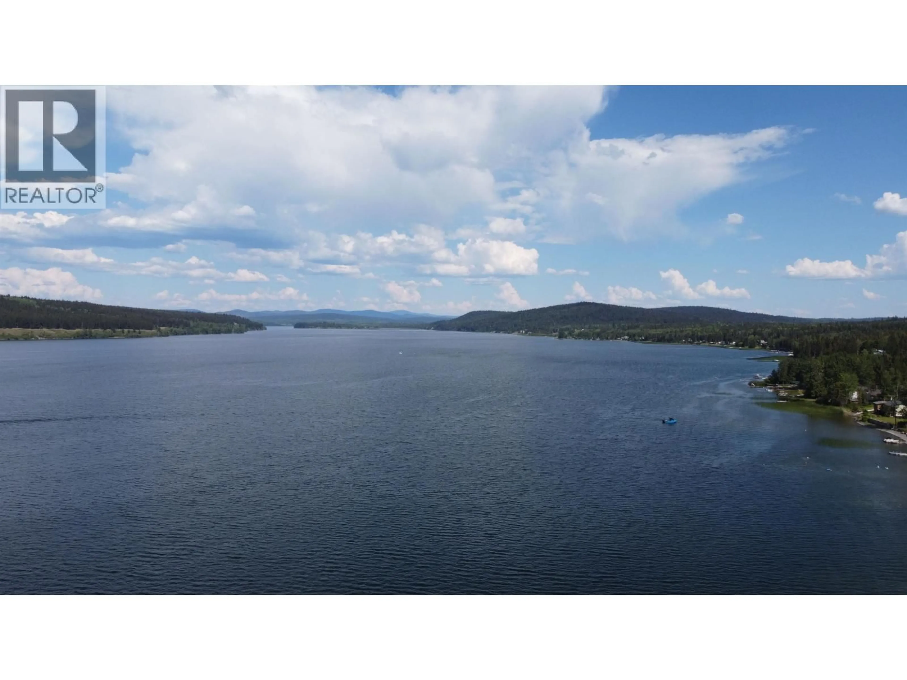 A pic from outside/outdoor area/front of a property/back of a property/a pic from drone, water/lake/river/ocean view for 6301 MULLIGAN ROAD, 100 Mile House British Columbia V0K2E3