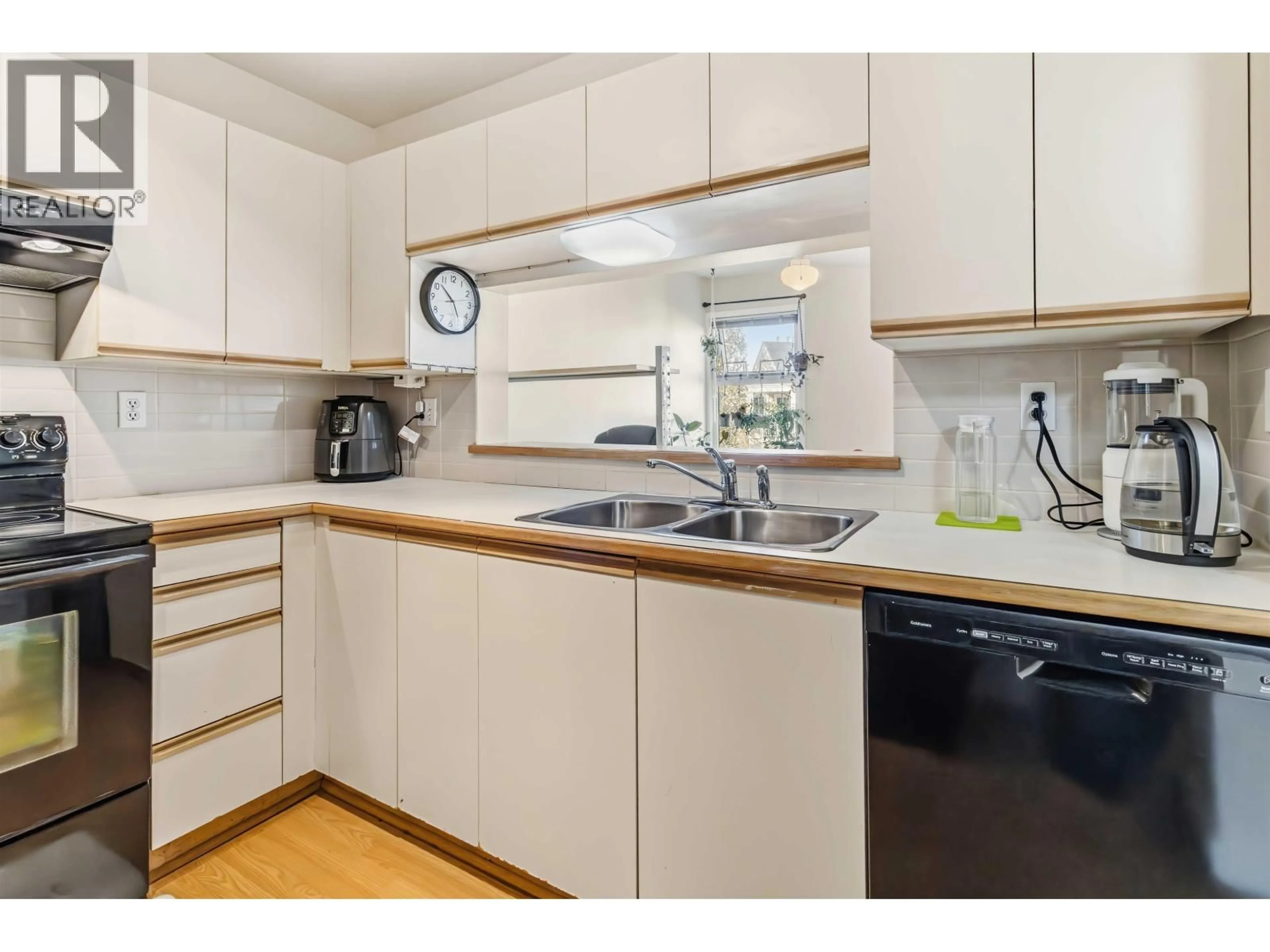 Standard kitchen, wood/laminate floor for 313 - 7435 MOFFATT ROAD, Richmond British Columbia V6Y1X9