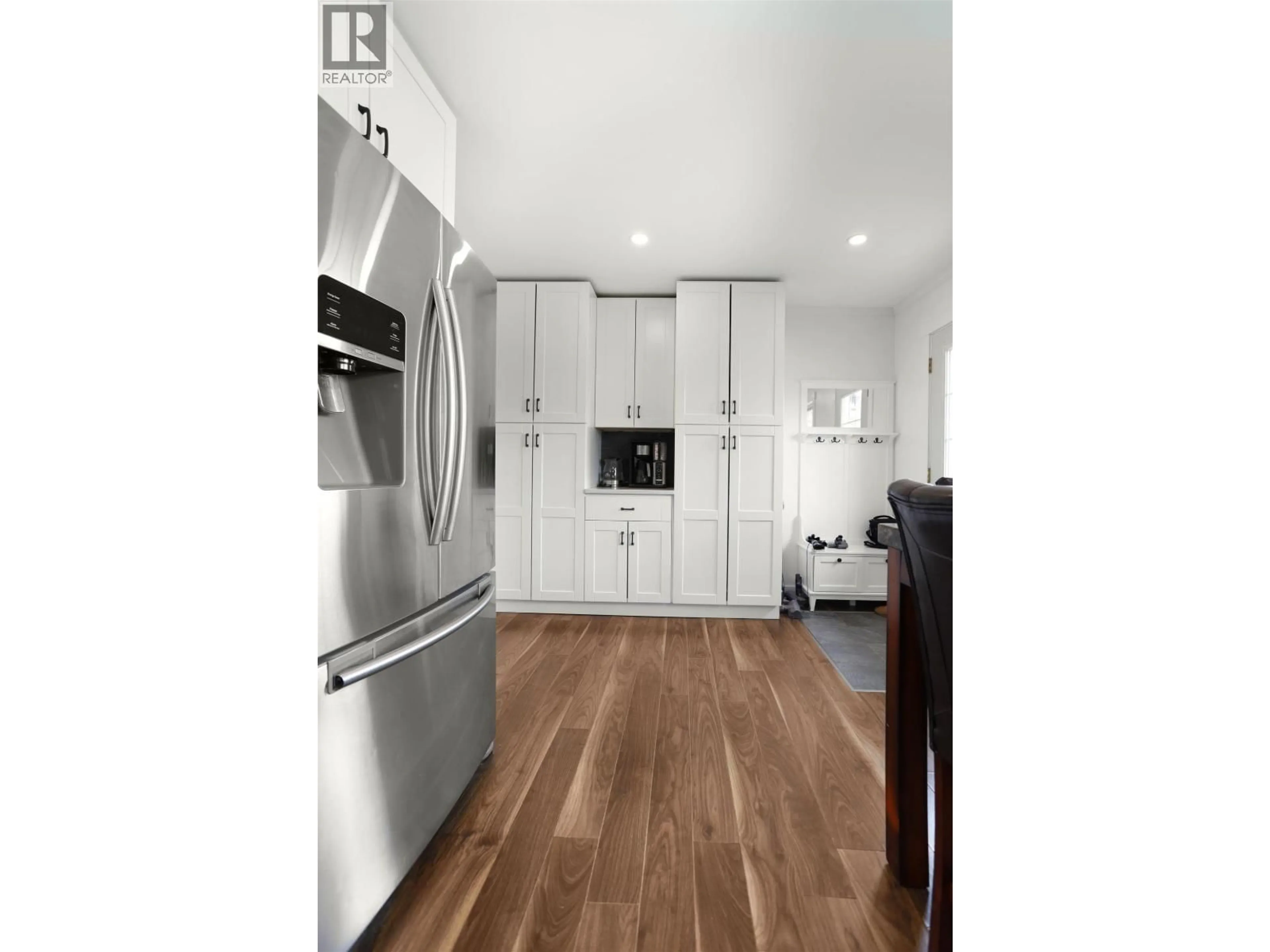 Open concept kitchen, wood/laminate floor for 48 FINCH STREET, Kitimat British Columbia V8C1T2