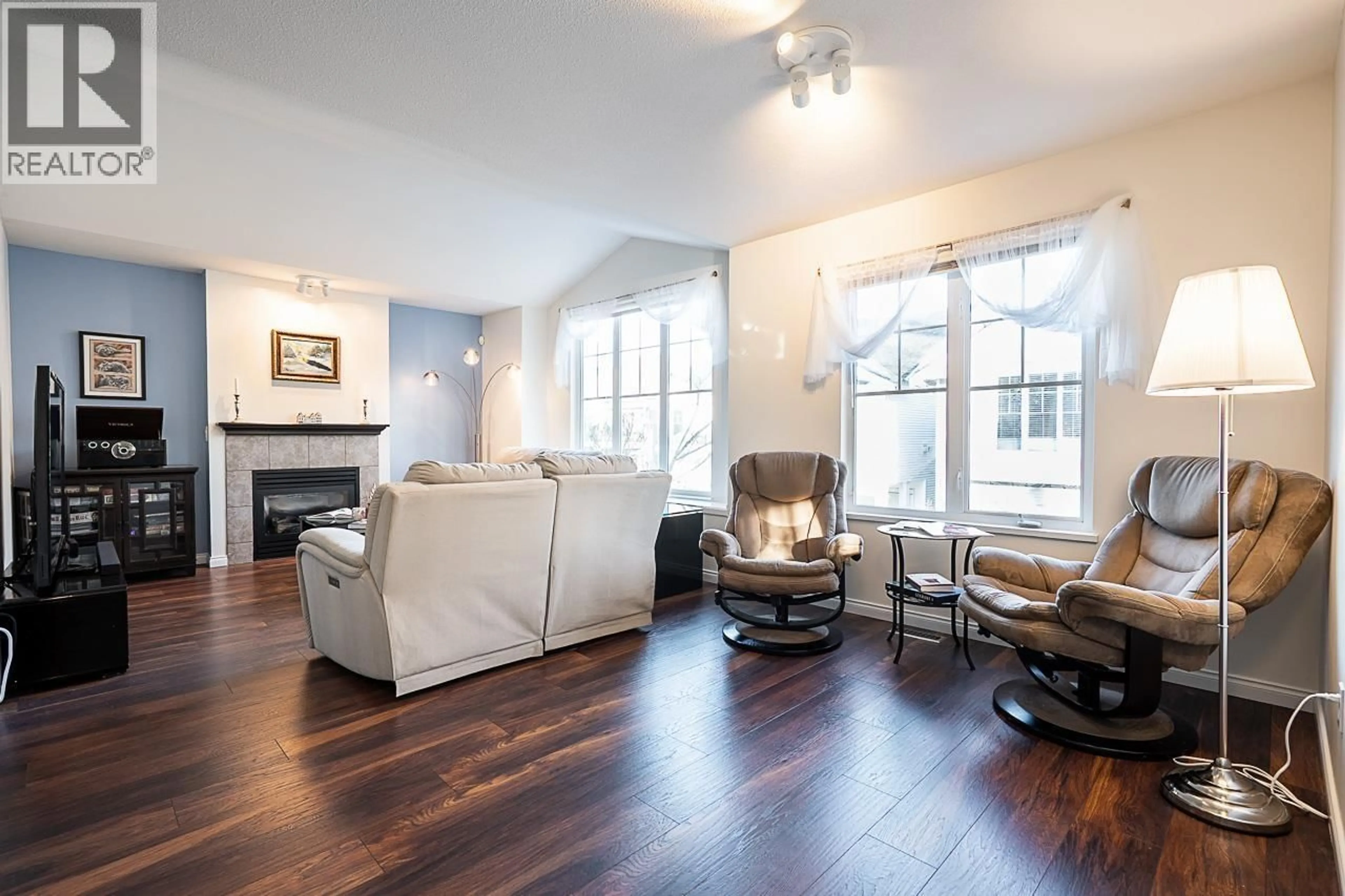 Living room with furniture, wood/laminate floor for 328 - 3000 RIVERBEND DRIVE, Coquitlam British Columbia V3C6R1