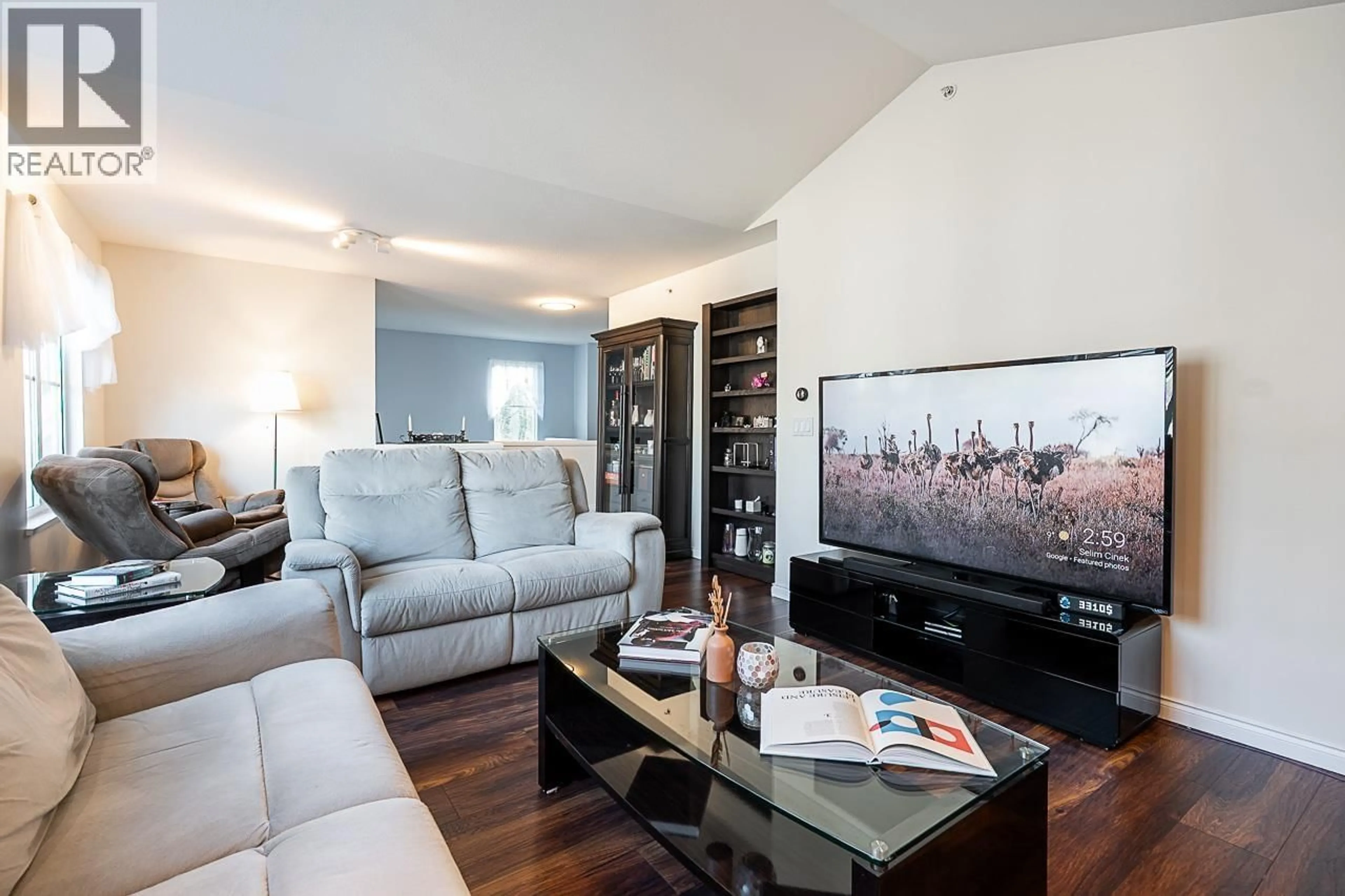 Living room with furniture, wood/laminate floor for 328 - 3000 RIVERBEND DRIVE, Coquitlam British Columbia V3C6R1