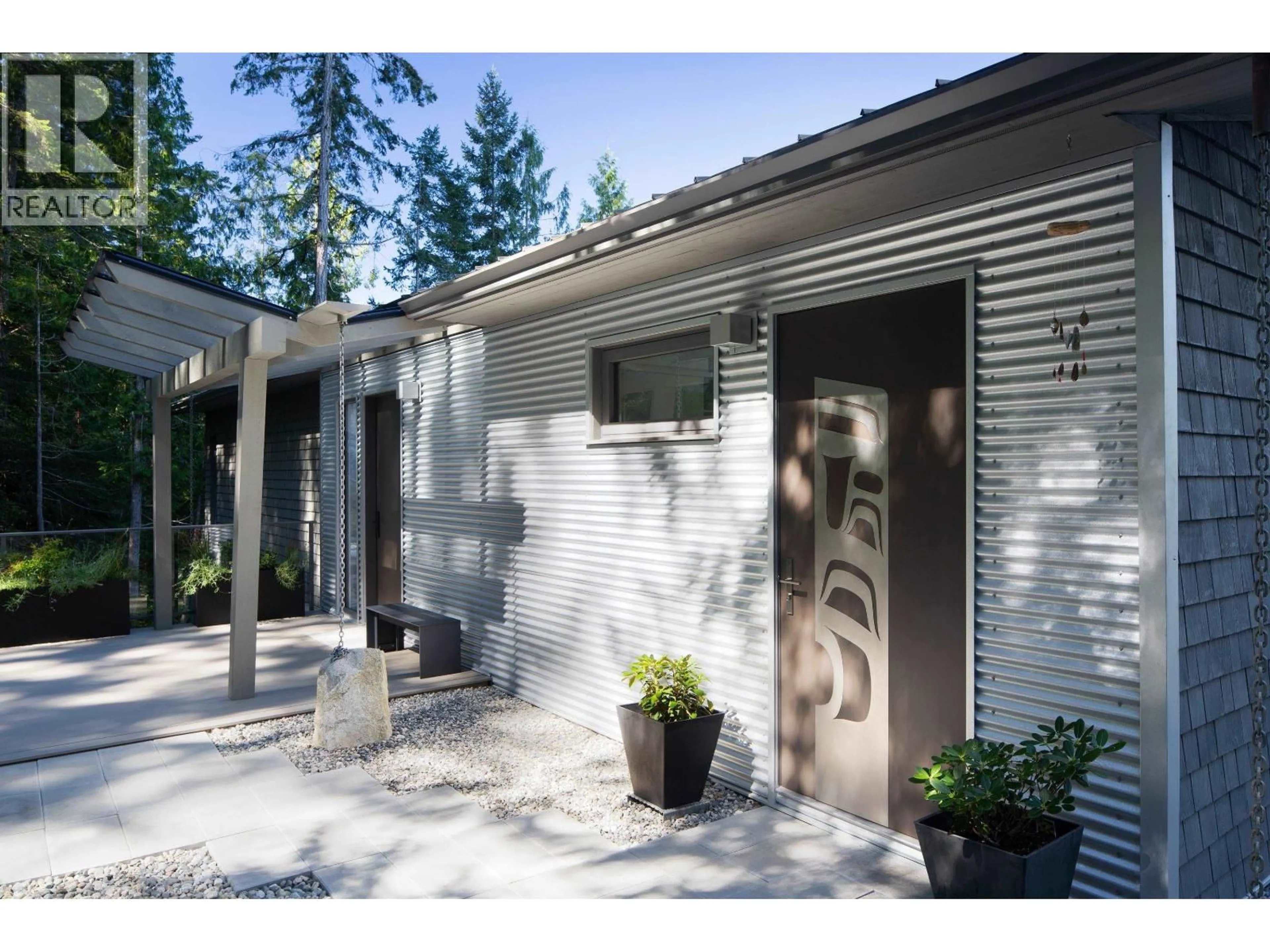 Home with vinyl exterior material, street for 4219 FRANCIS PENINSULA ROAD, Pender Harbour British Columbia V0N2H1