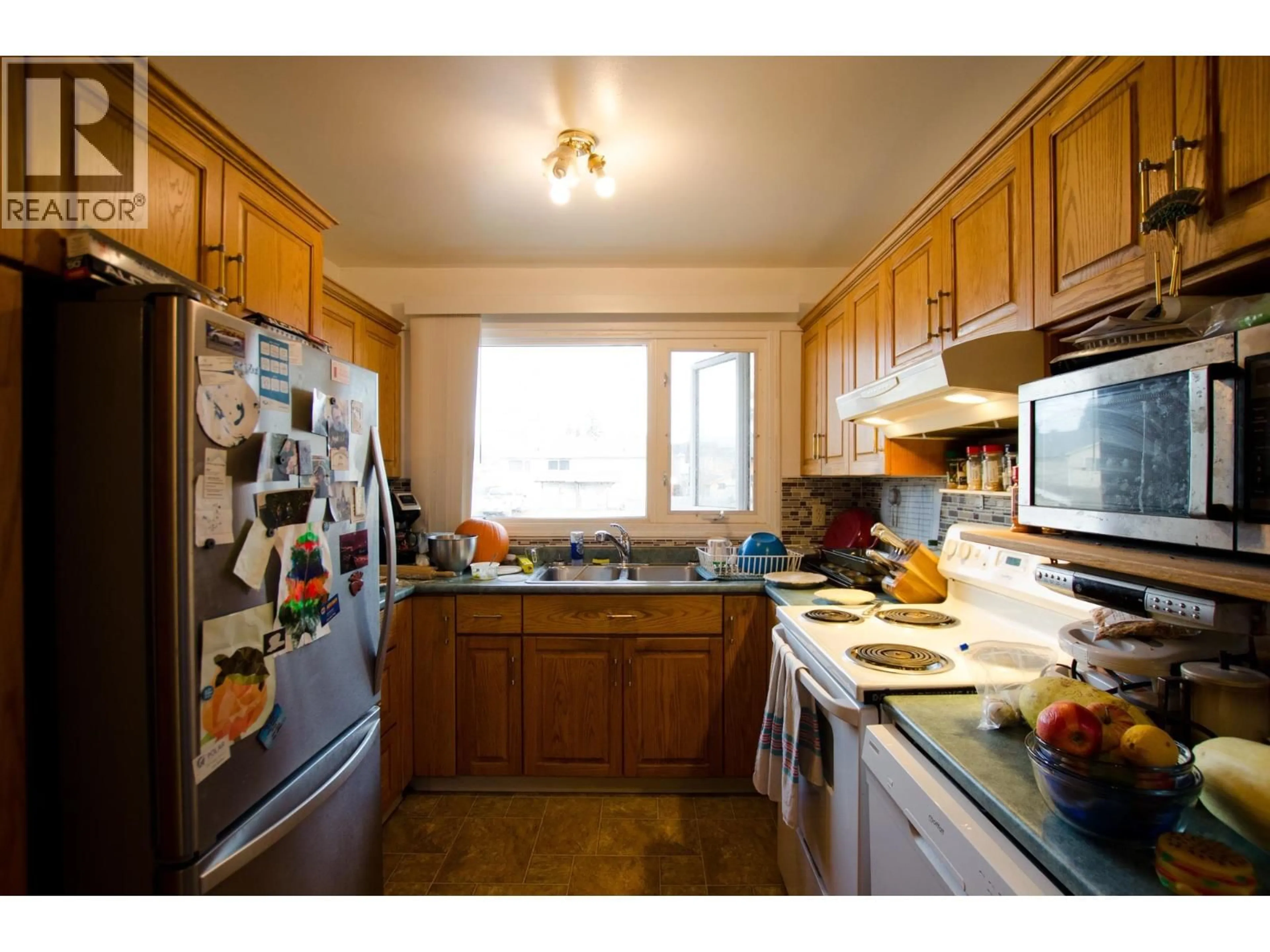 Standard kitchen, wood/laminate floor for 2212 VICTORIA STREET, Prince George British Columbia V2L2L9