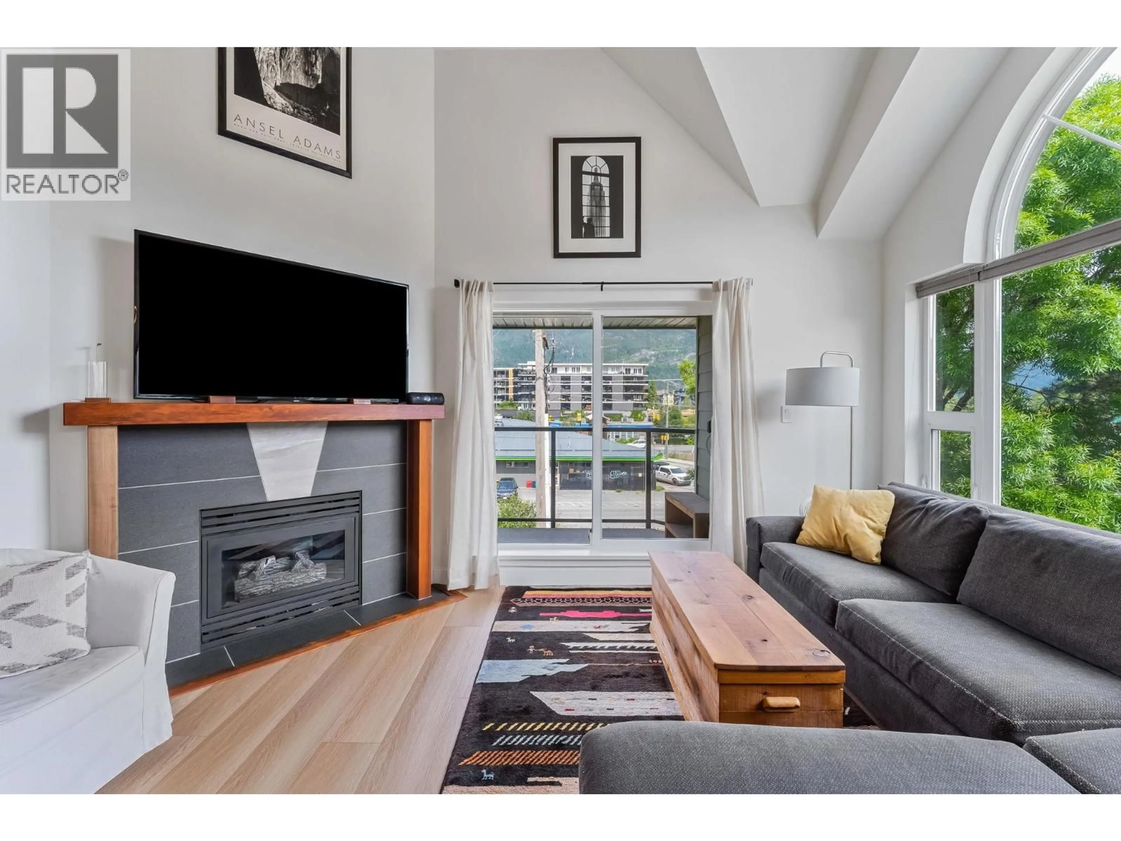 Living room with furniture, unknown for 312 - 1466 PEMBERTON AVENUE, Squamish British Columbia V8B0K1