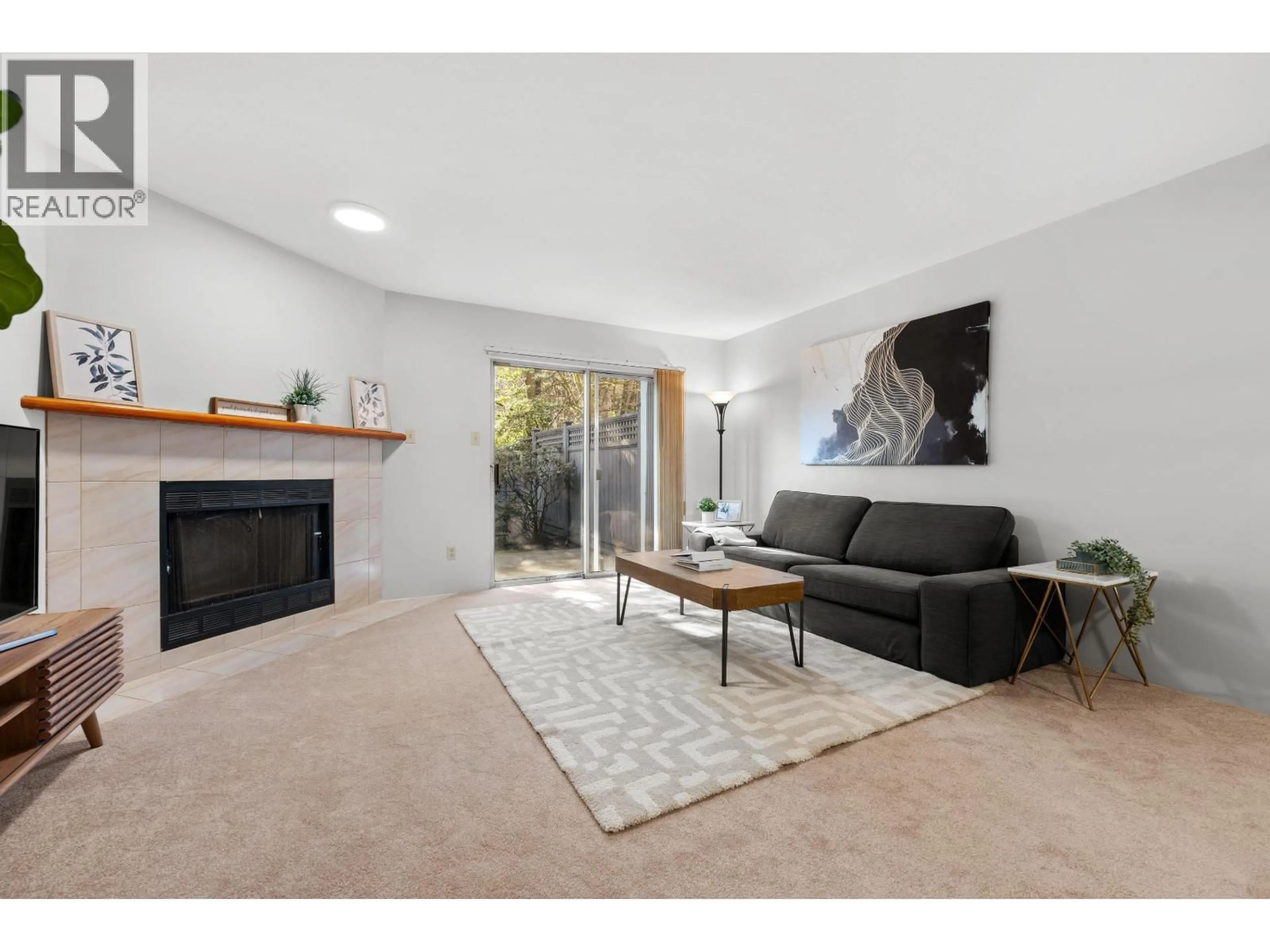 Living room with furniture, unknown for 4 - 6631 COONEY ROAD, Richmond British Columbia V6Y3T2