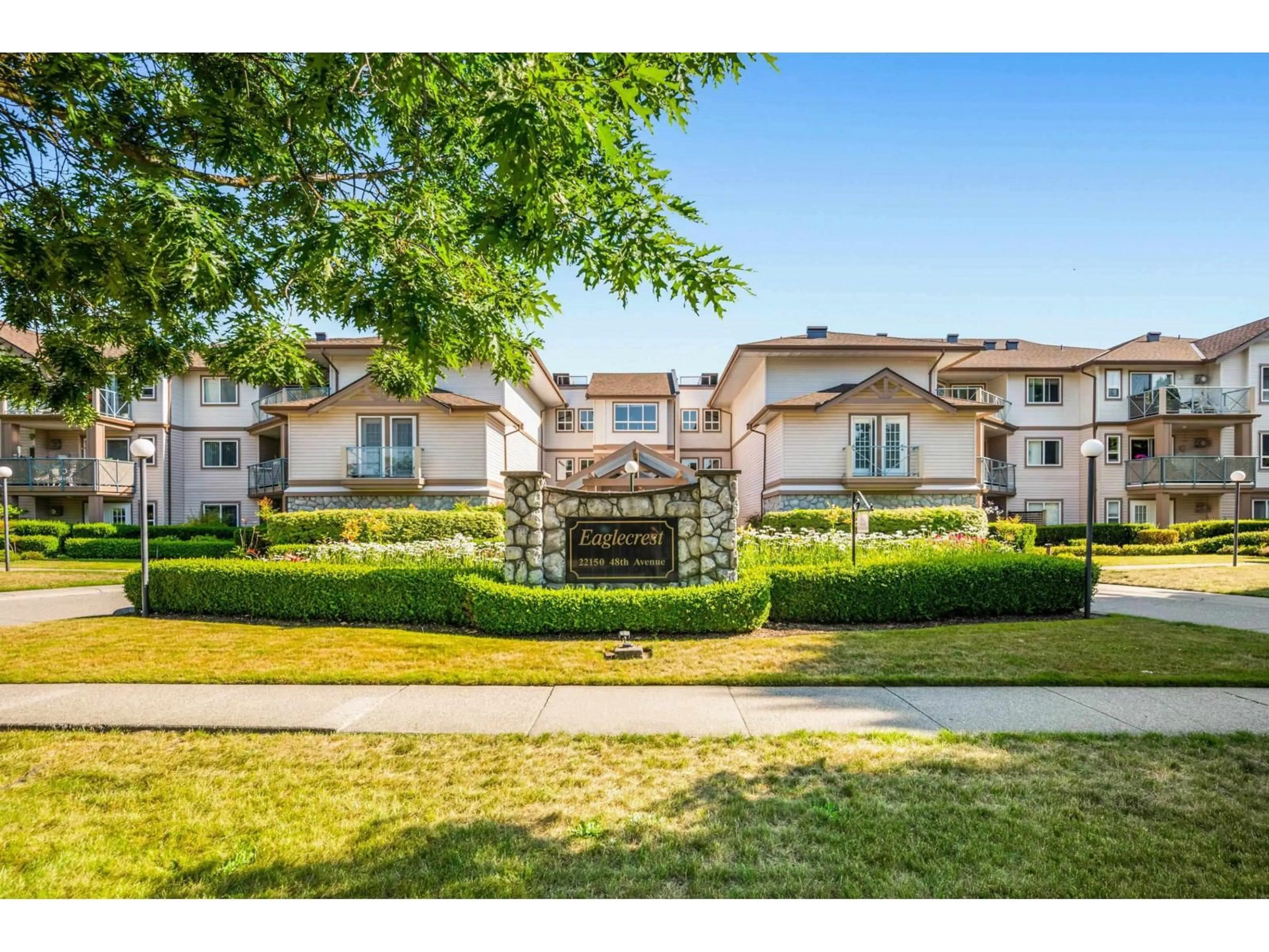 A pic from outside/outdoor area/front of a property/back of a property/a pic from drone, street for 115 - 22150 48 AVENUE, Langley British Columbia V3A8R5