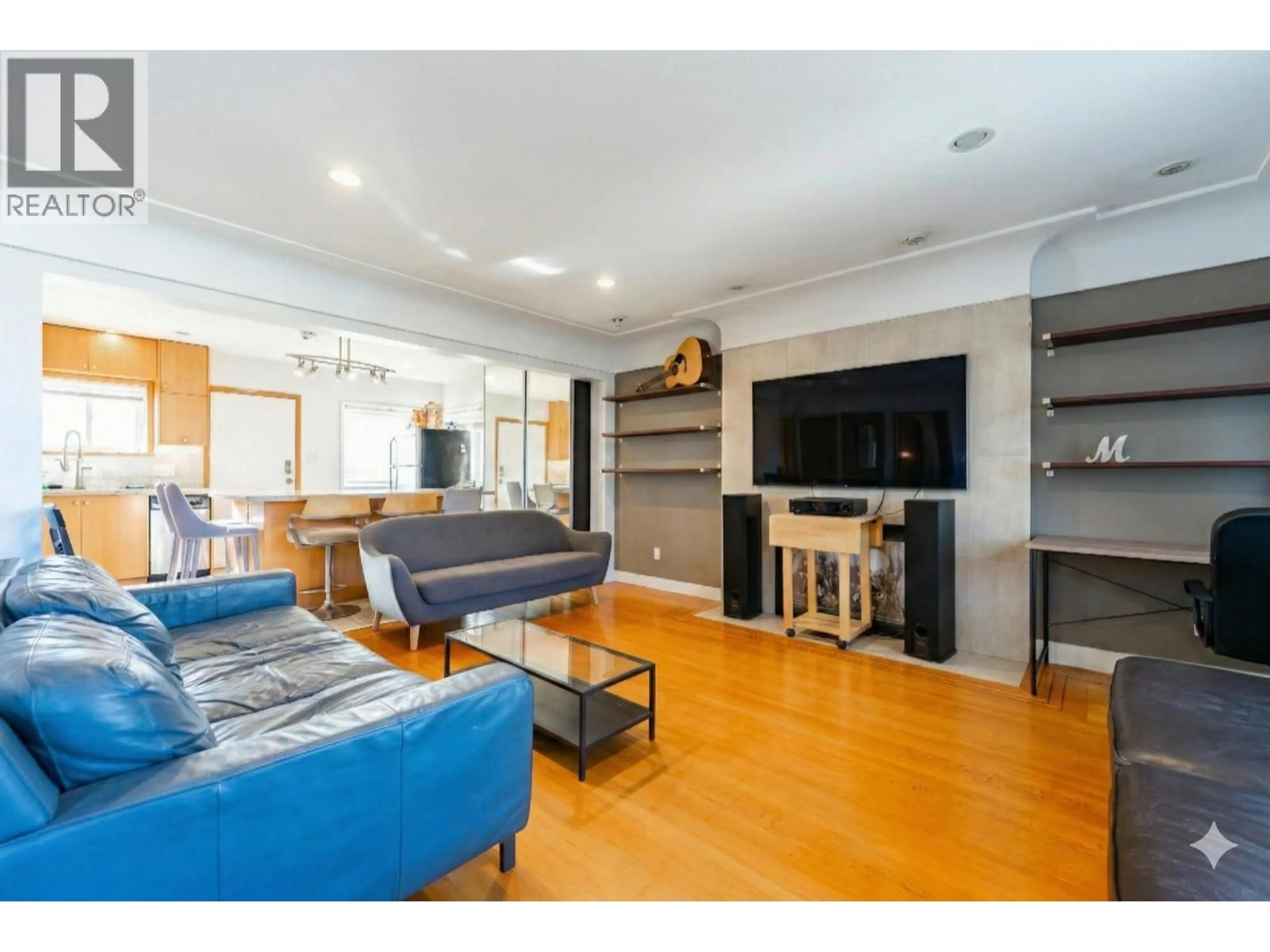 Living room with furniture, wood/laminate floor for 3654 25TH AVENUE, Vancouver British Columbia V5R1K5