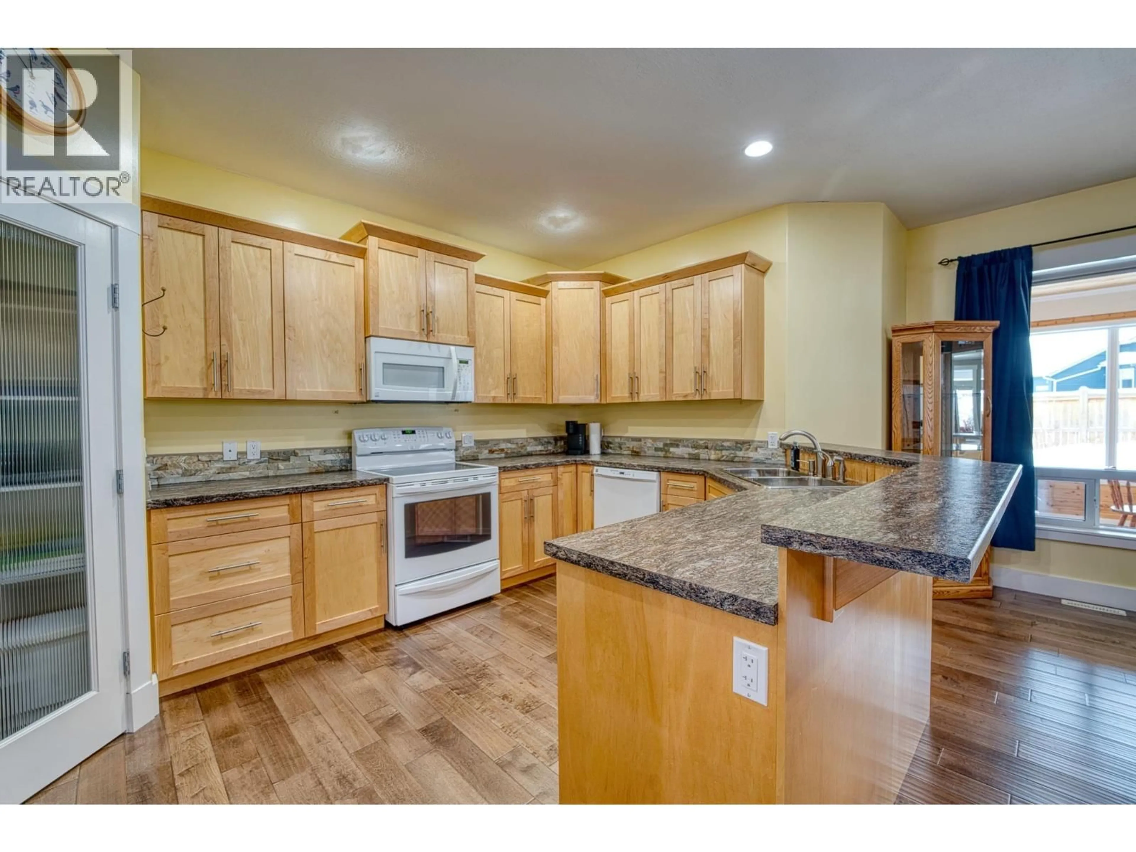 Open concept kitchen, unknown for 11719 103A STREET, Fort St. John British Columbia V1J0L4