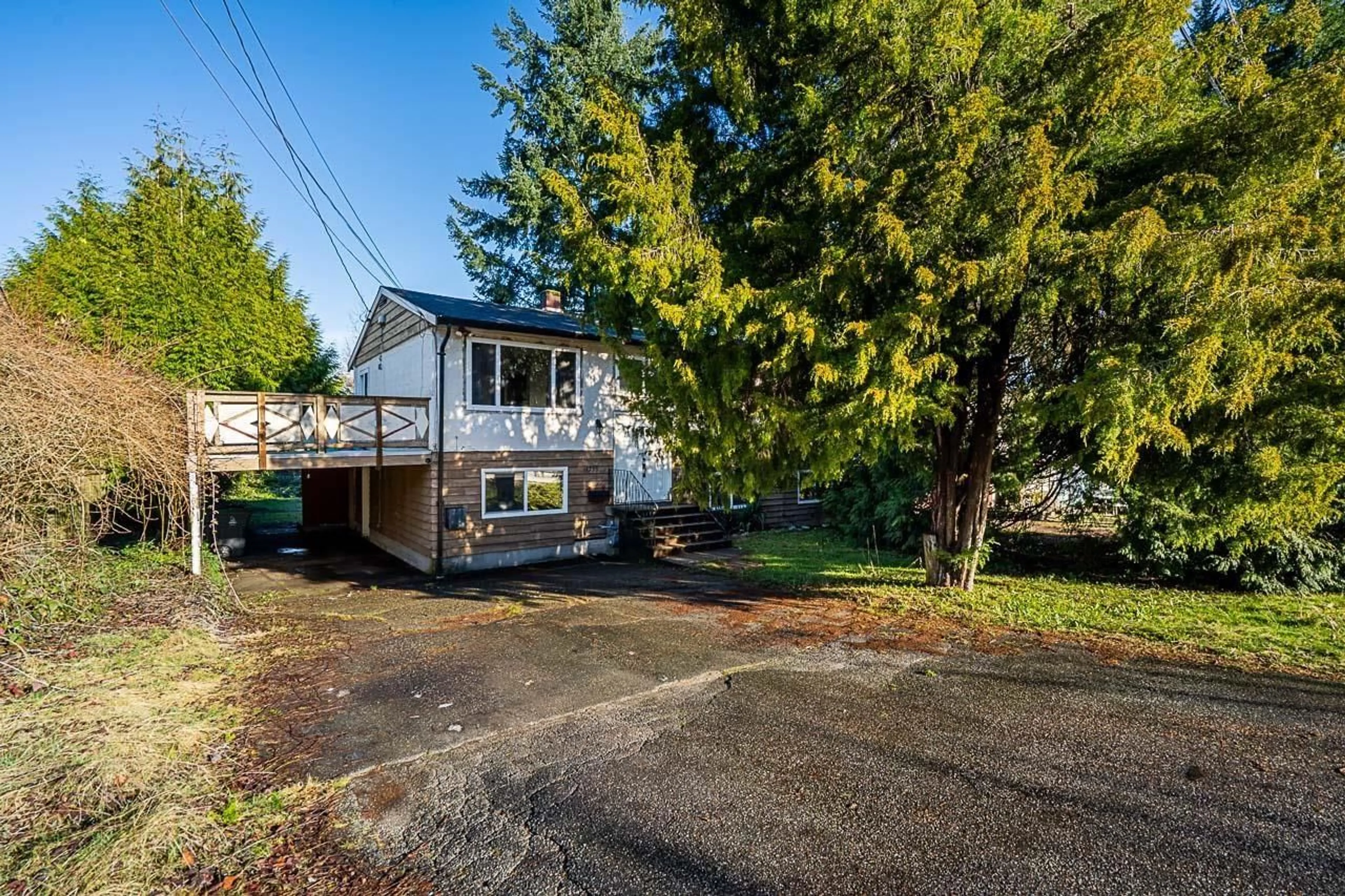 Home with vinyl exterior material, street for 14735 107A AVENUE, Surrey British Columbia V3R1V2