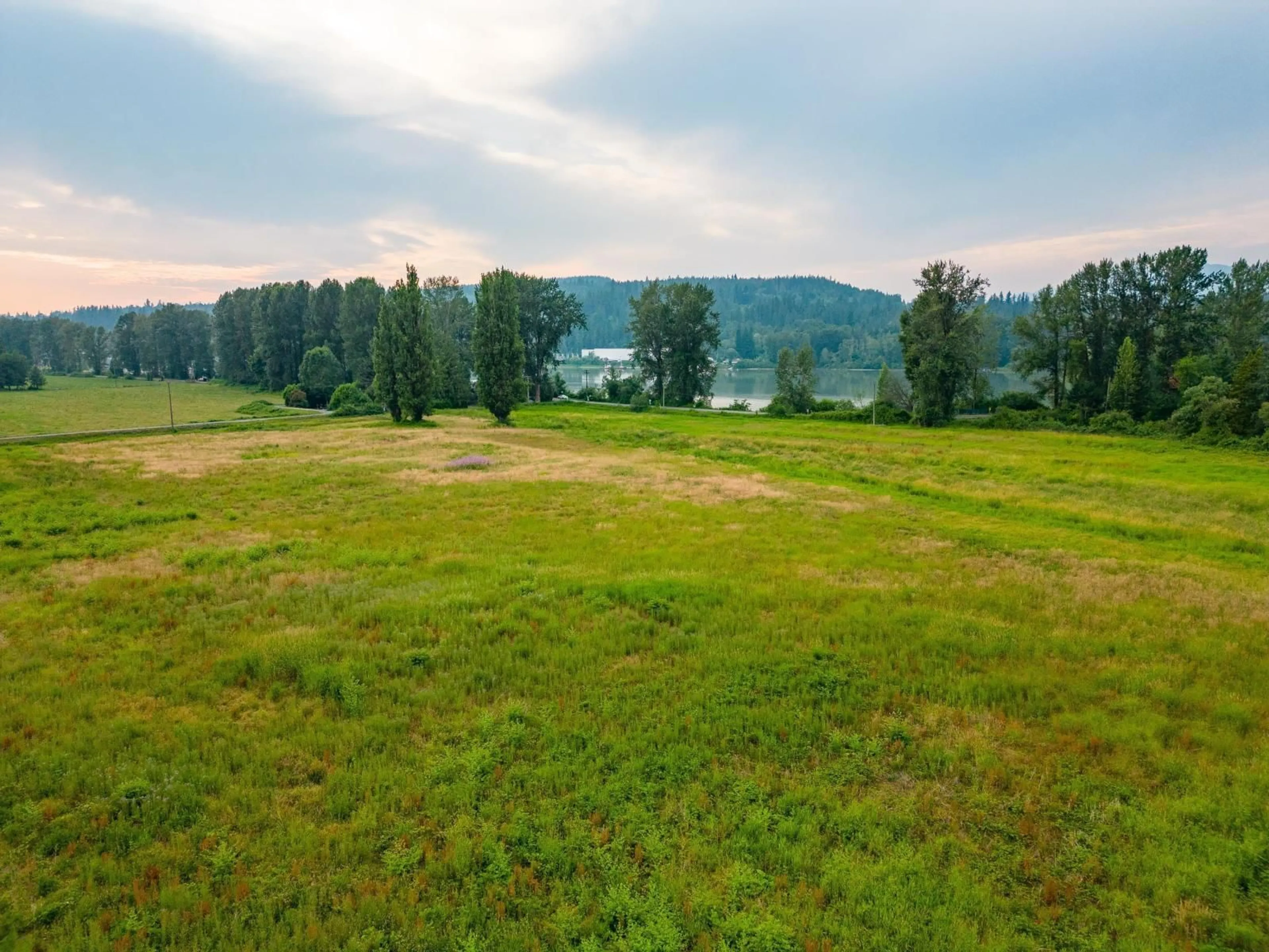 A pic from outside/outdoor area/front of a property/back of a property/a pic from drone, water/lake/river/ocean view for 27612 RIVER ROAD, Abbotsford British Columbia V4X2H1