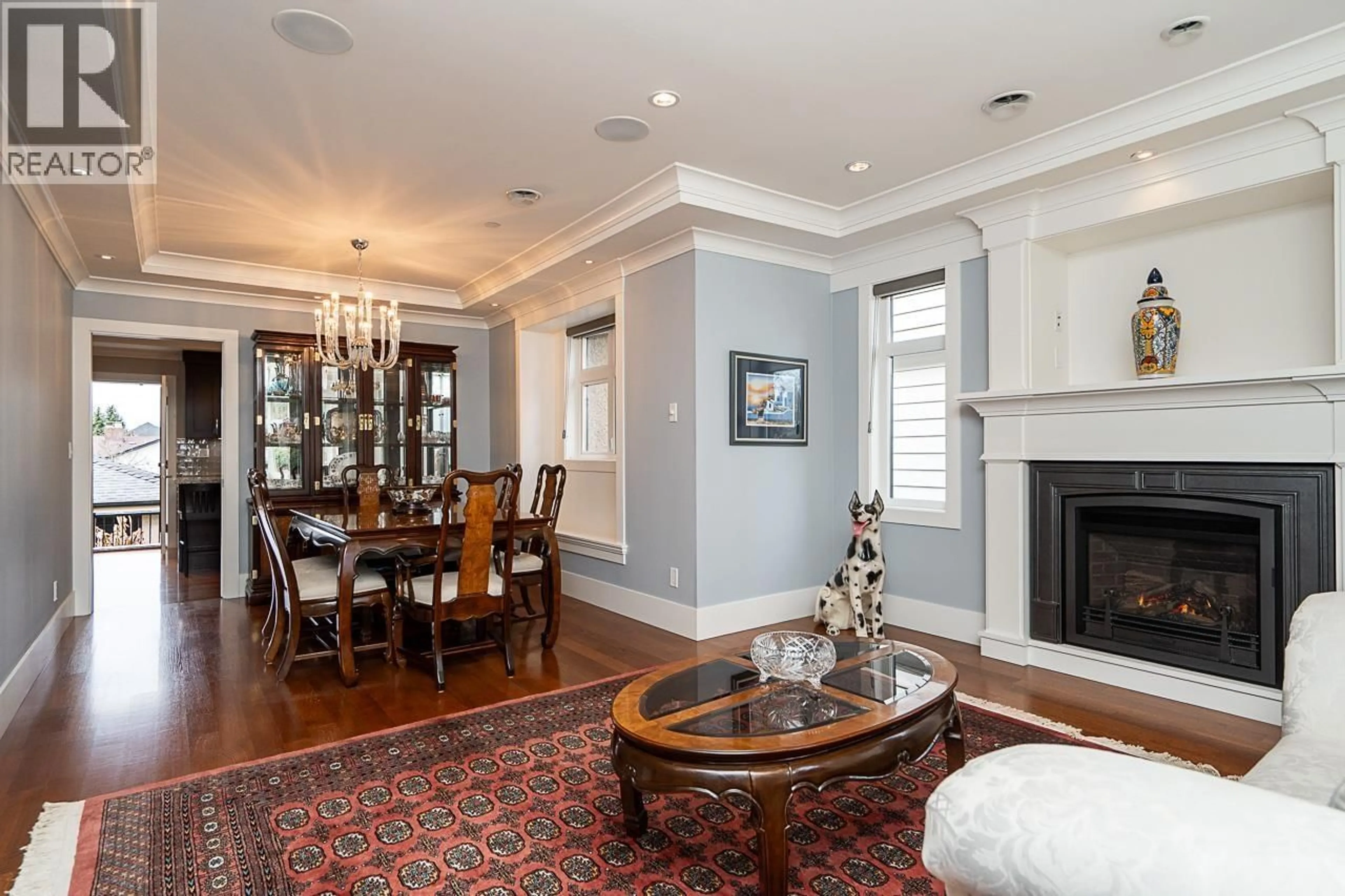 Living room with furniture, wood/laminate floor for 6907 TYNE STREET, Vancouver British Columbia V5S3M4