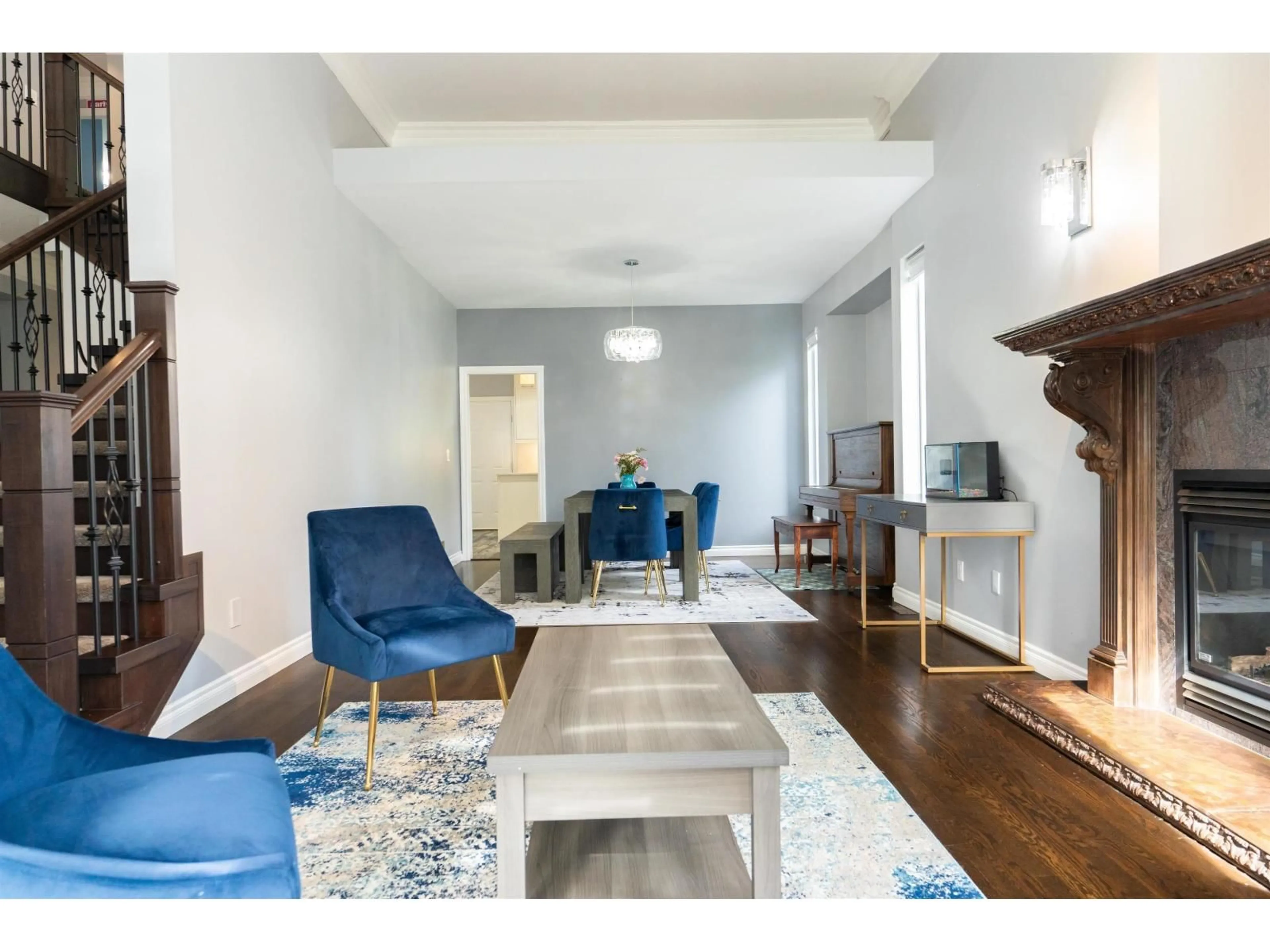 Living room with furniture, wood/laminate floor for 14135 90A AVENUE, Surrey British Columbia V3V8E1