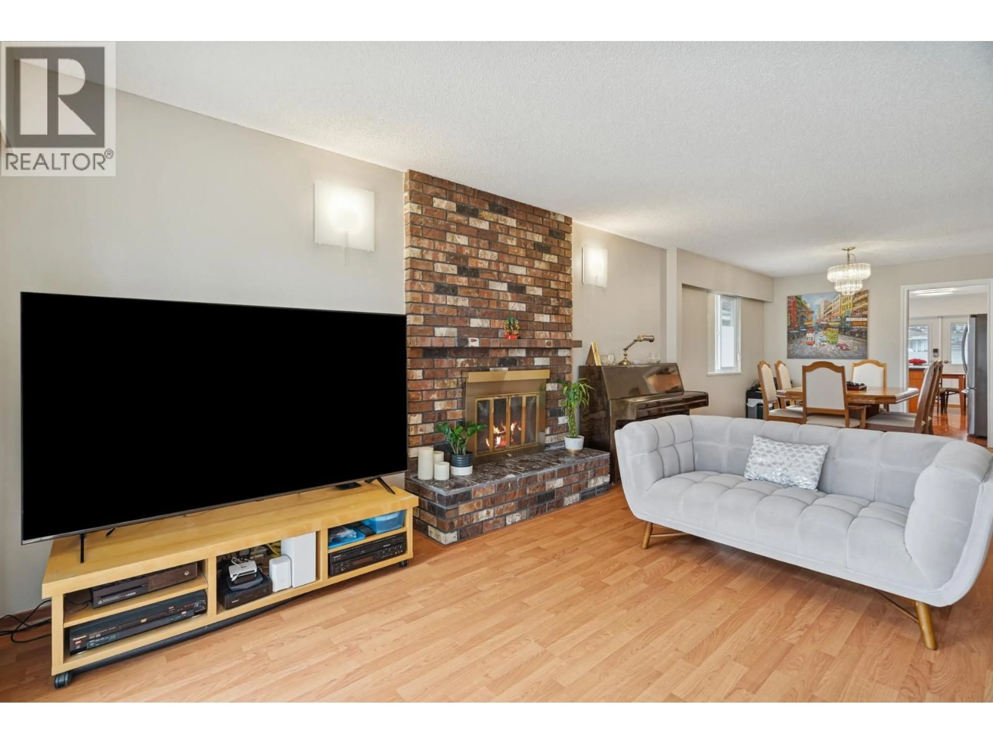 Living room with furniture, wood/laminate floor for 4356 OXFORD STREET, Burnaby British Columbia V5C1E4