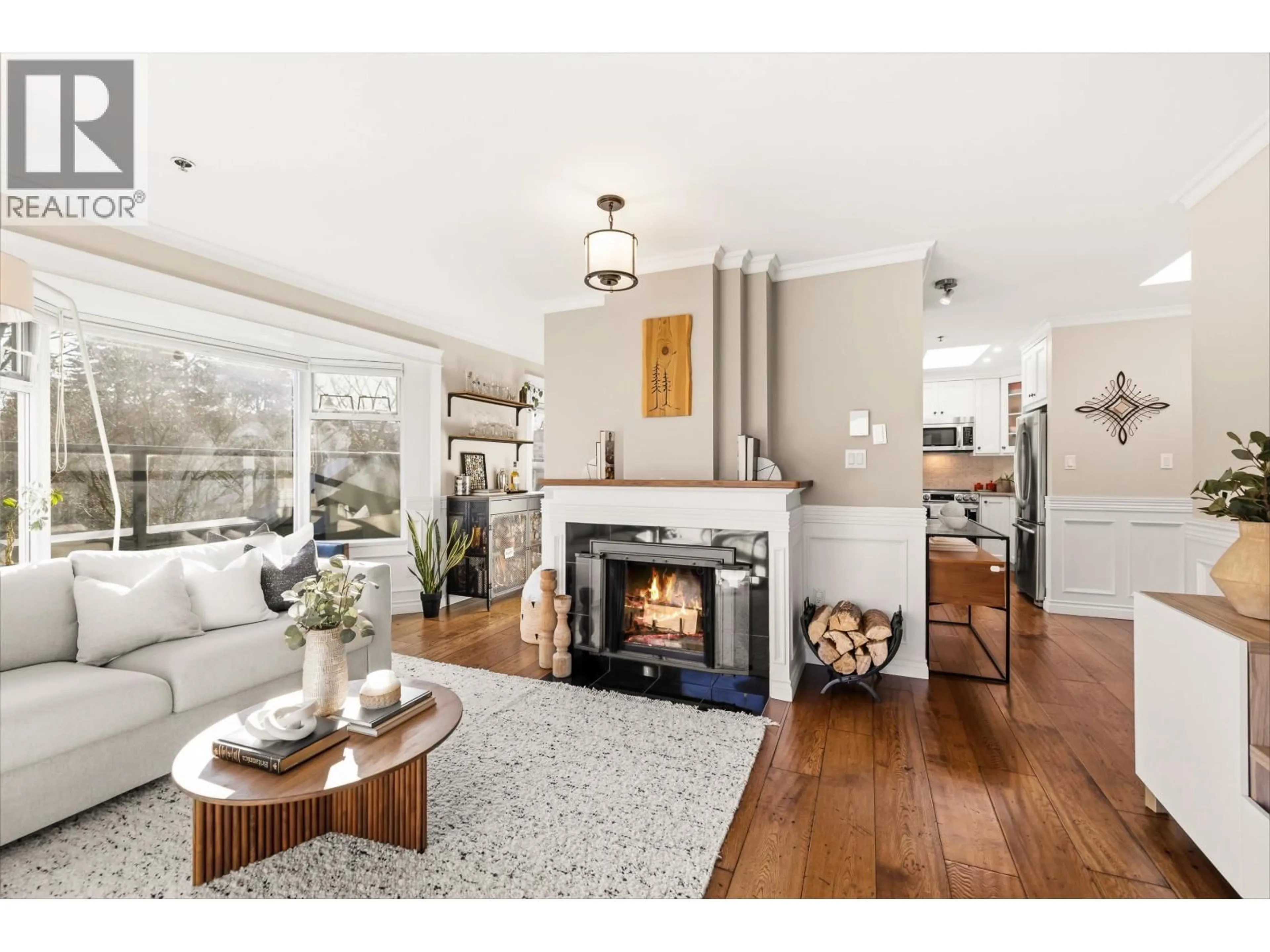 Living room with furniture, wood/laminate floor for 401 - 1925 2ND AVENUE, Vancouver British Columbia V6J1J2