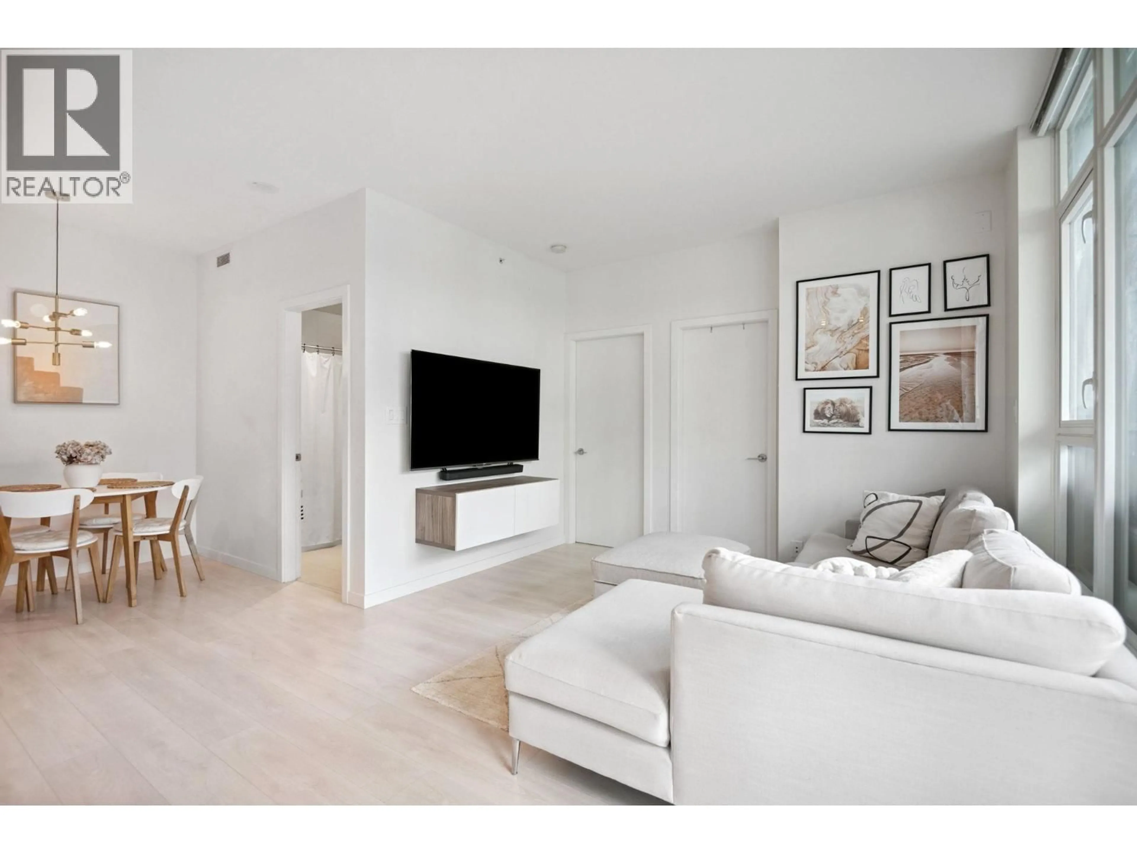 Living room with furniture, unknown for 208 - 691 NORTH ROAD, Coquitlam British Columbia V3J0H9