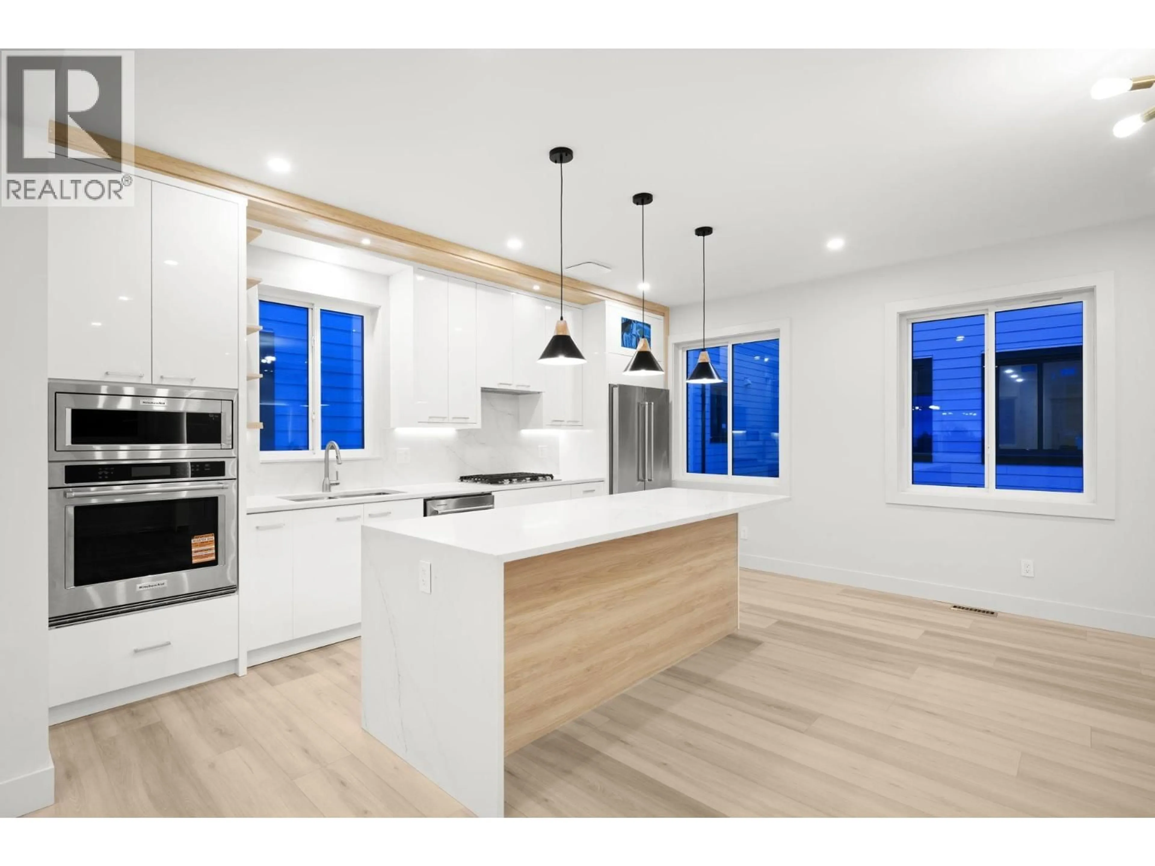 Open concept kitchen, wood/laminate floor for 2 - 3881 HURST STREET, Burnaby British Columbia V5J1M4