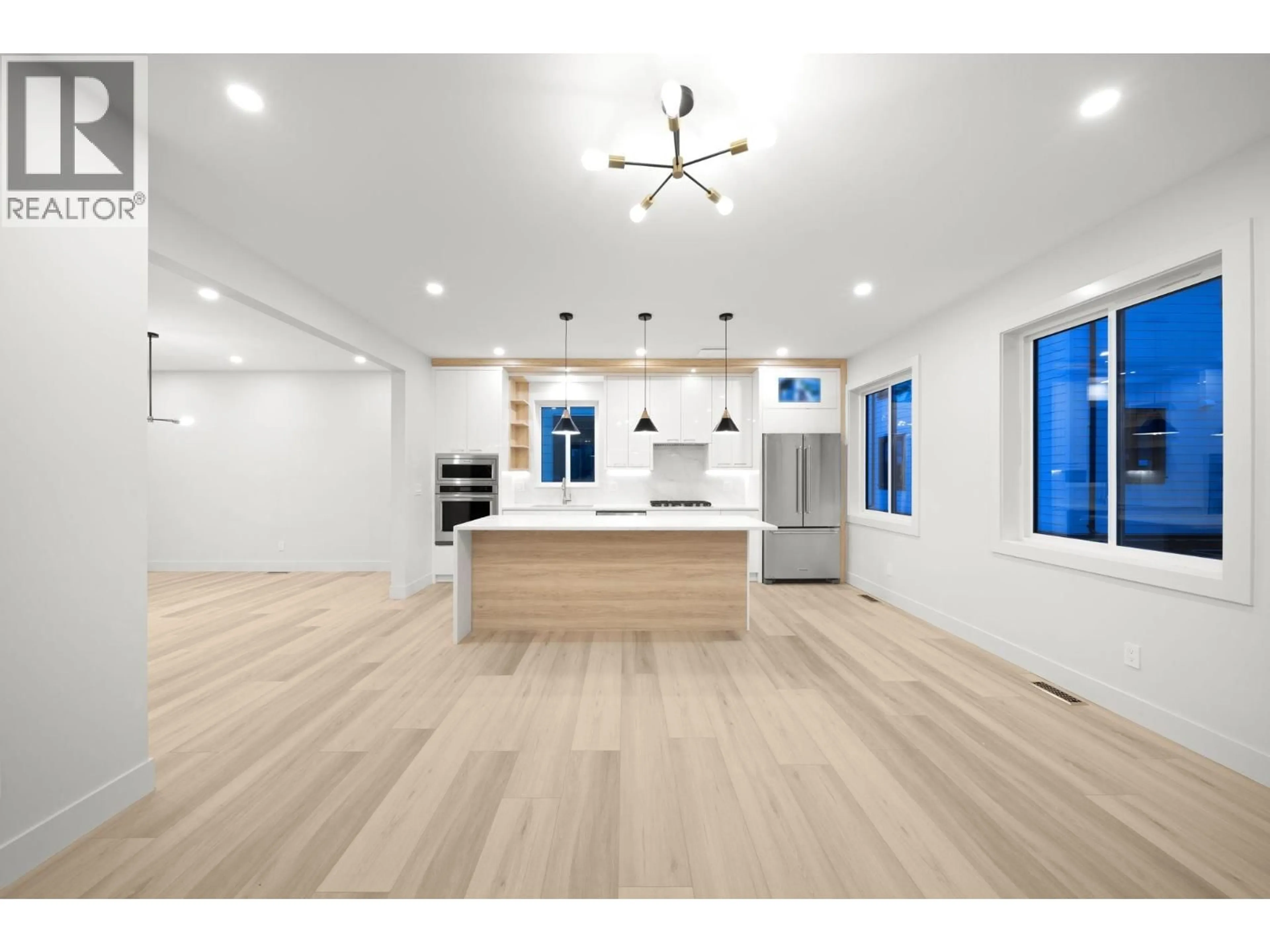 Open concept kitchen, wood/laminate floor for 2 - 3881 HURST STREET, Burnaby British Columbia V5J1M4