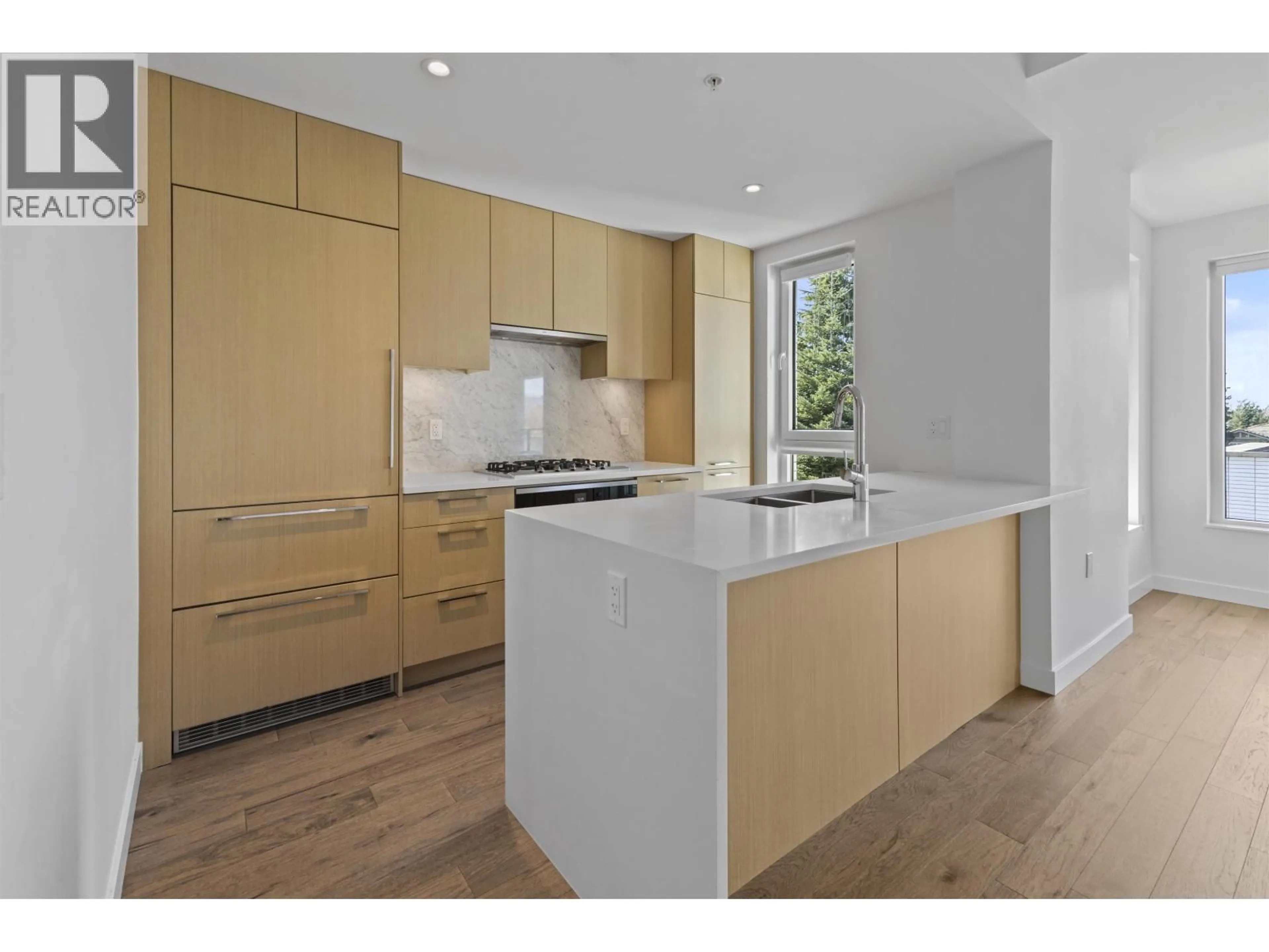 Open concept kitchen, wood/laminate floor for 307 - 5383 CAMBIE STREET, Vancouver British Columbia V5Z2Z9
