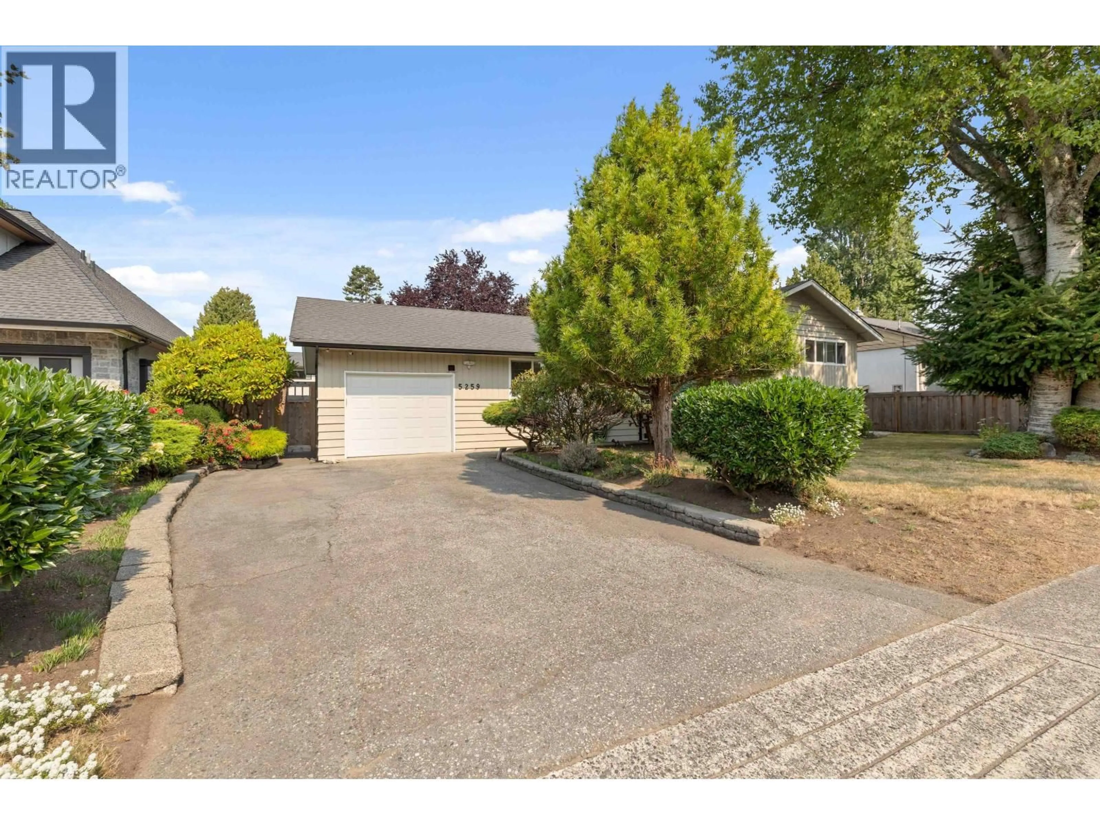 A pic from outside/outdoor area/front of a property/back of a property/a pic from drone, street for 5259 12 AVENUE, Delta British Columbia V4M2B1