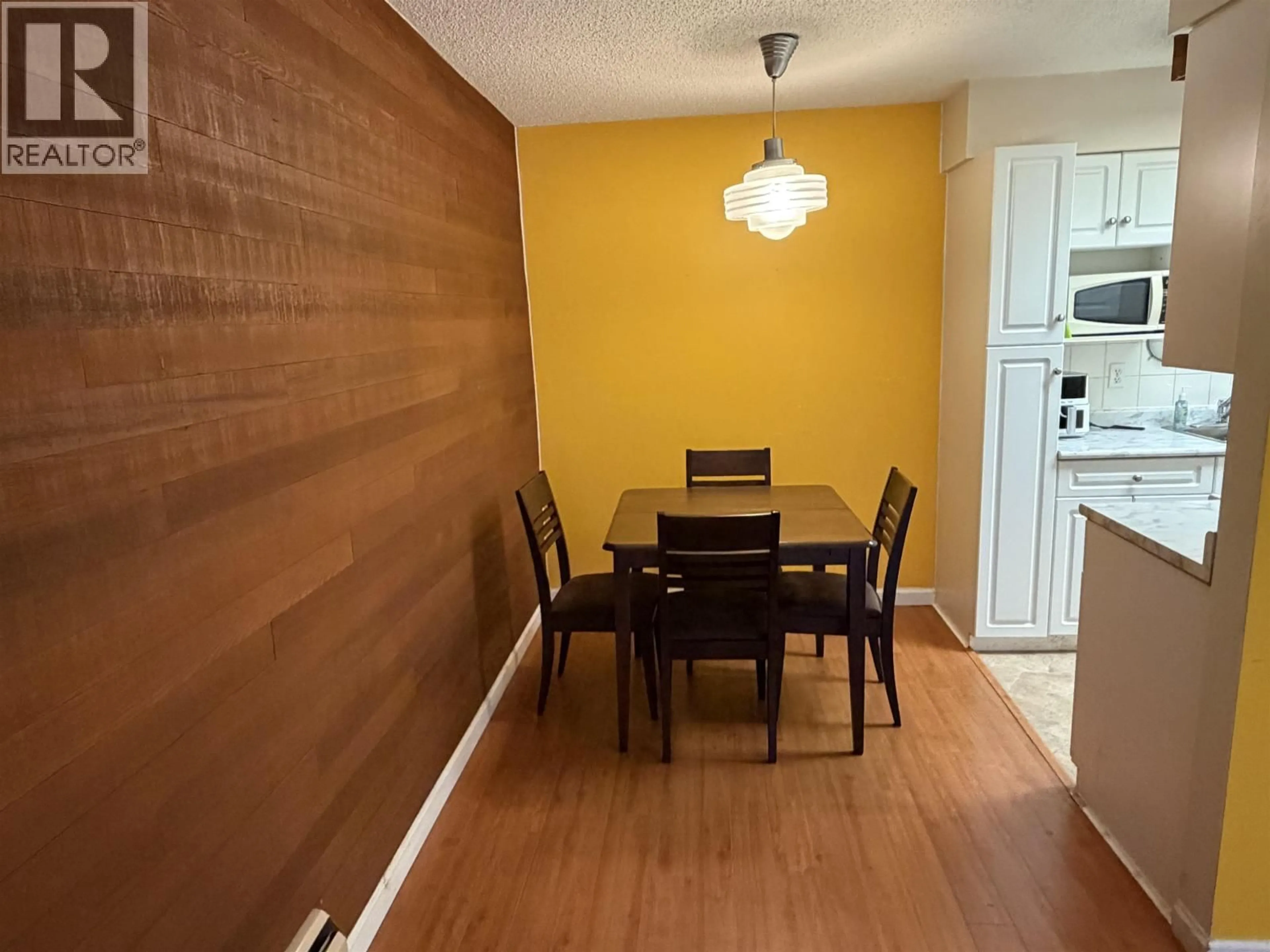 Dining room, wood/laminate floor for 109 - 3925 KINGSWAY, Burnaby British Columbia V5H3Y7