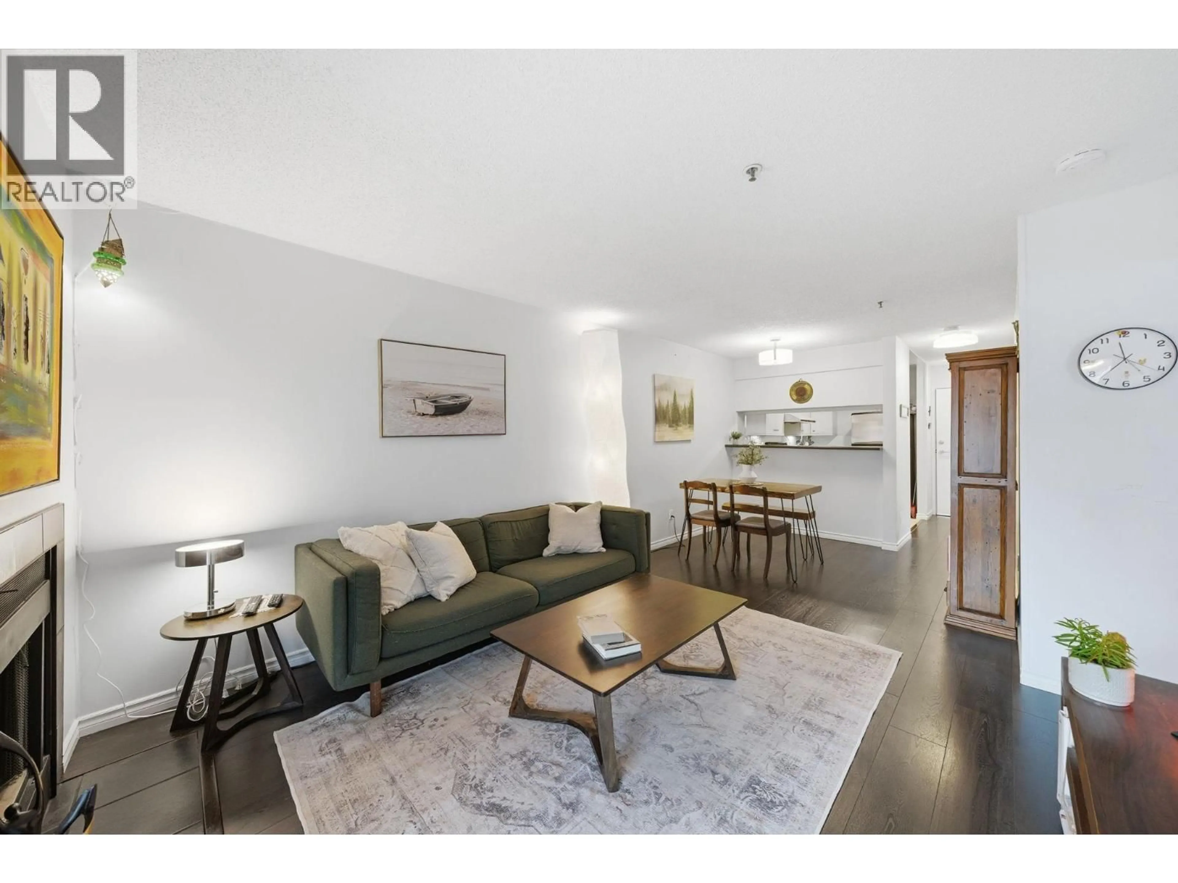 Living room with furniture, wood/laminate floor for 203 - 555 8TH AVENUE, Vancouver British Columbia V5T1S9