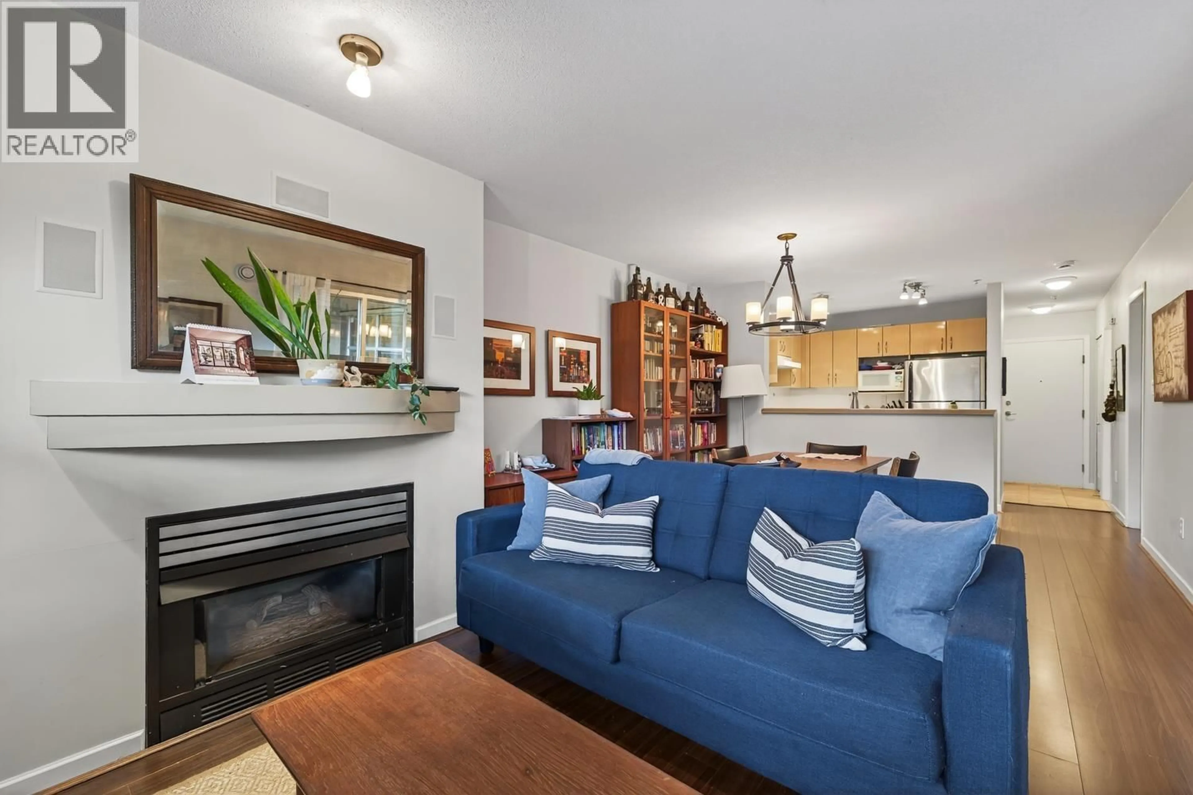 Living room with furniture, wood/laminate floor for 106 - 2983 4TH AVENUE, Vancouver British Columbia V6K1R5
