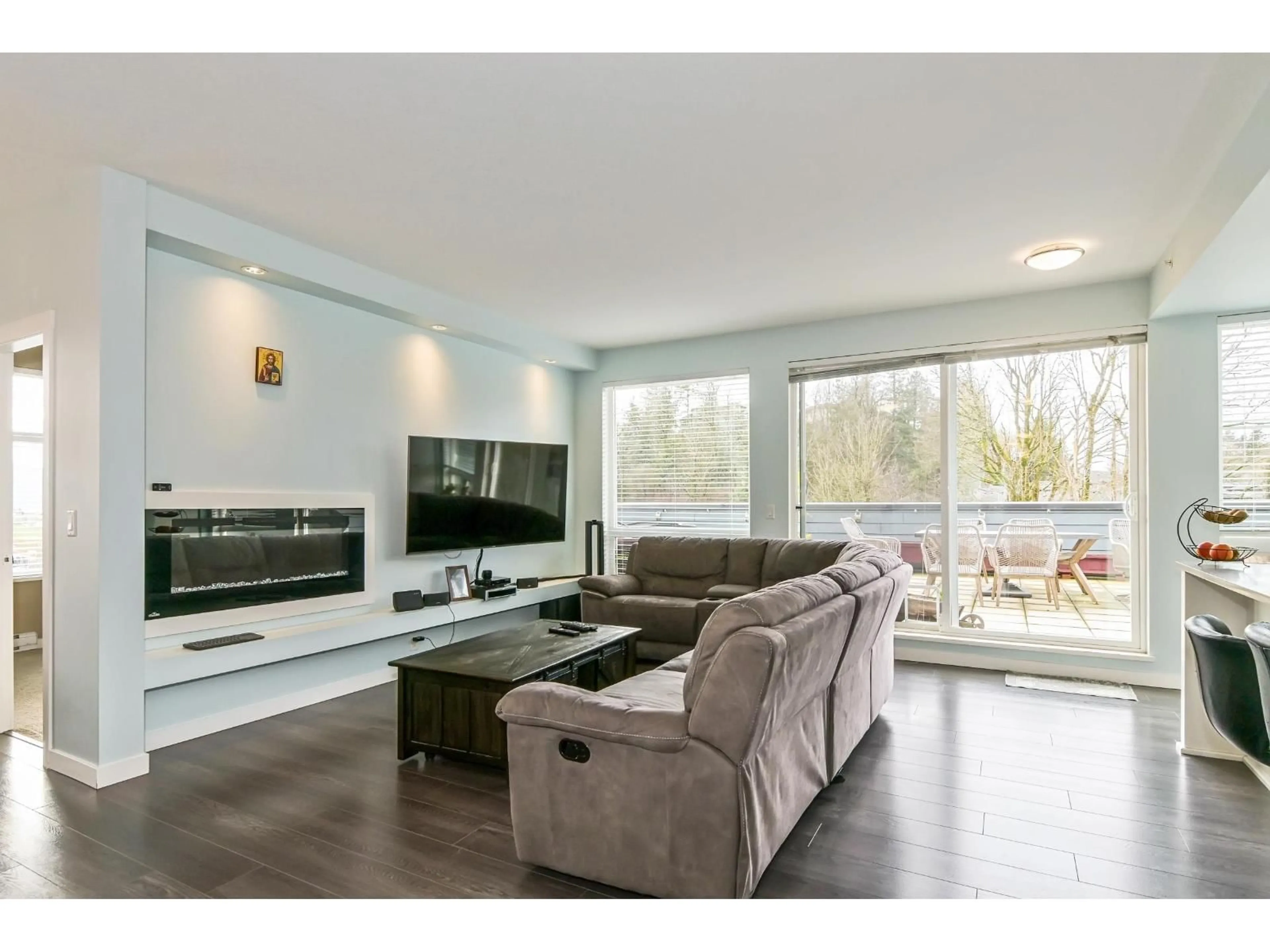 Living room with furniture, unknown for 411 - 2242 WHATCOM ROAD, Abbotsford British Columbia V3G0G3