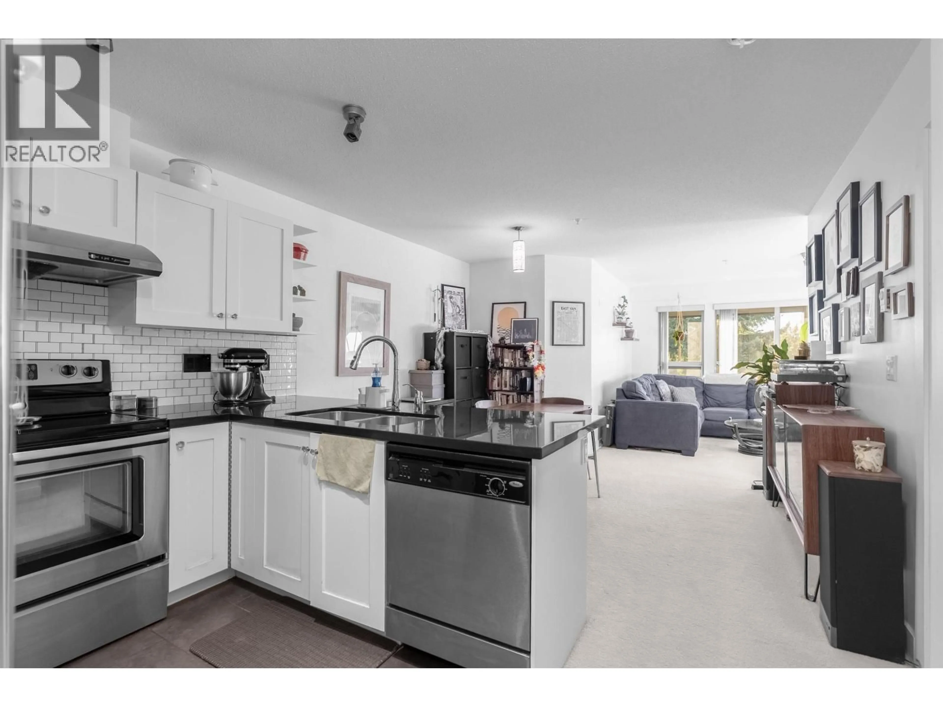 Open concept kitchen, ceramic/tile floor for 305 - 4550 FRASER STREET, Vancouver British Columbia V5V4G8