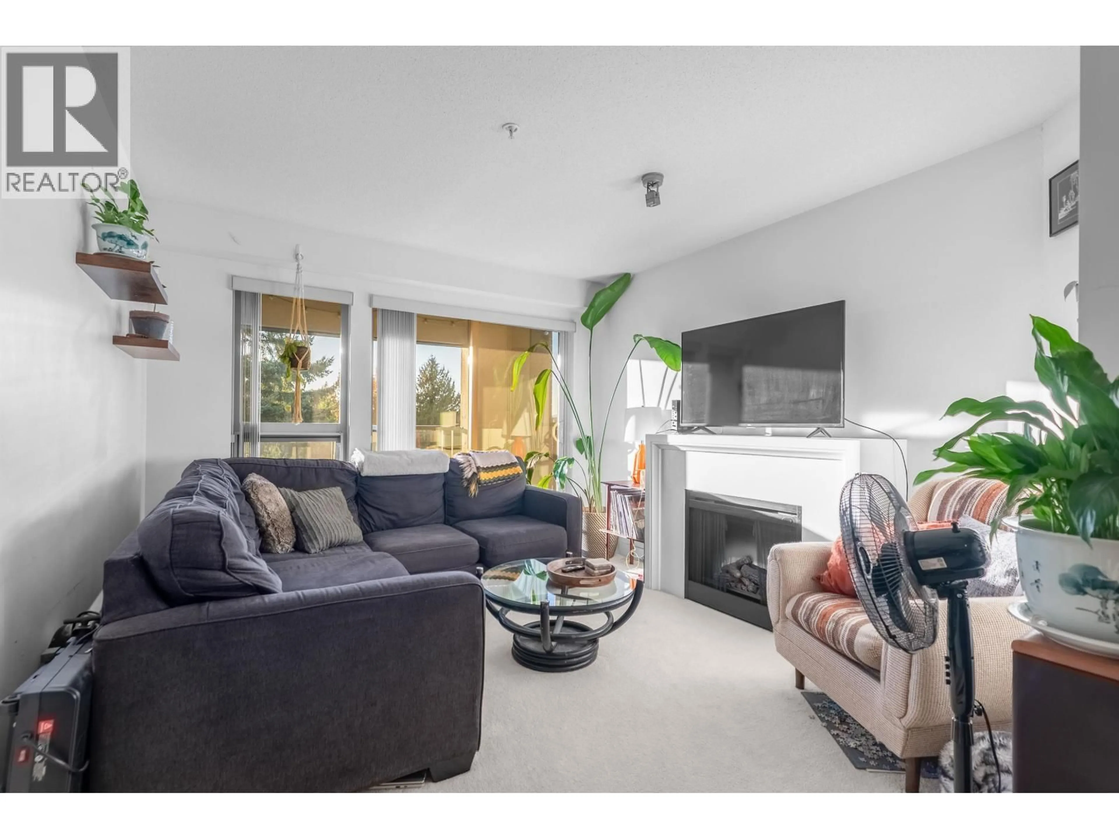 Living room with furniture, unknown for 305 - 4550 FRASER STREET, Vancouver British Columbia V5V4G8