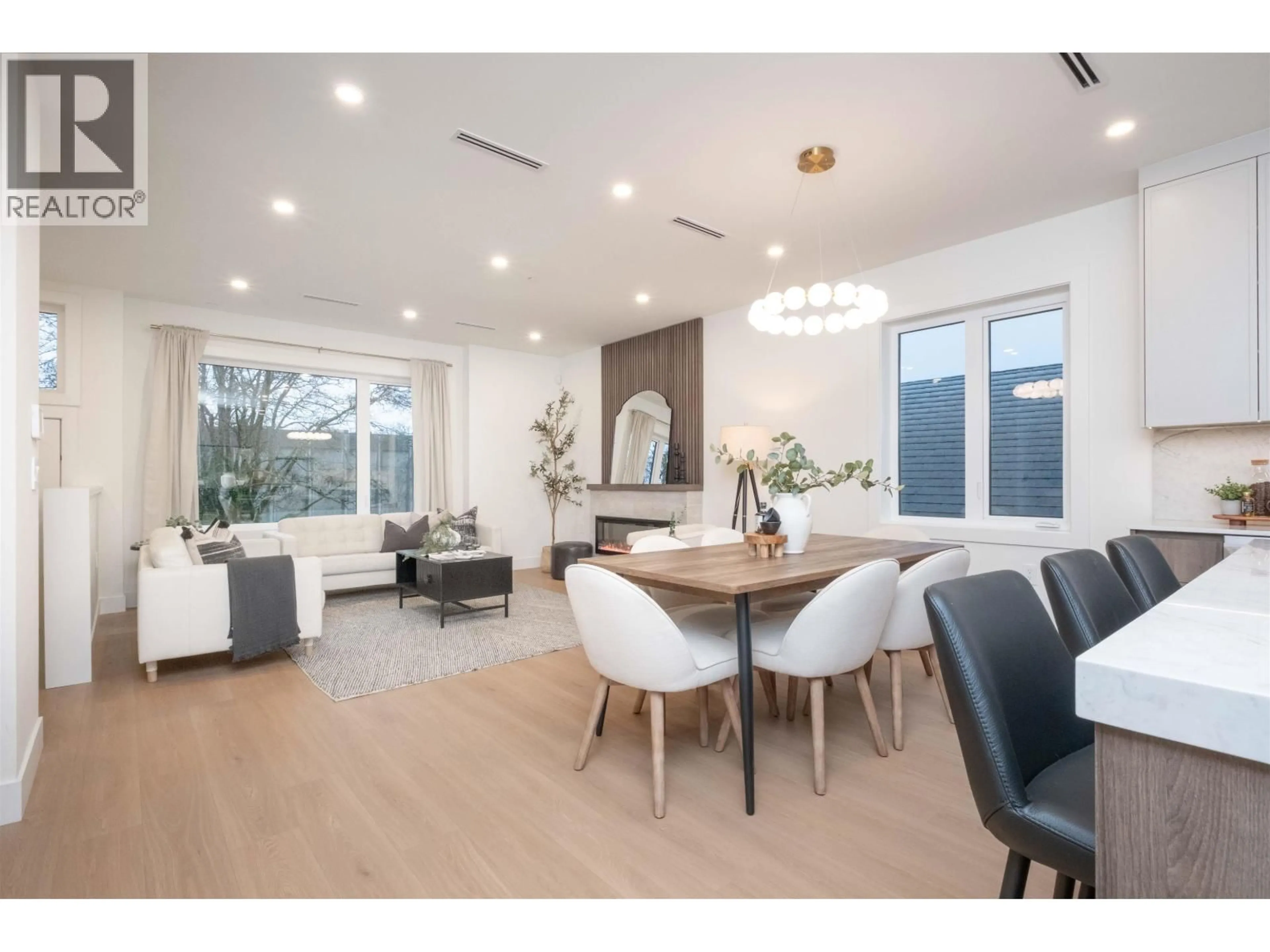 Dining room, wood/laminate floor for 3 - 2667 PENDER STREET, Vancouver British Columbia V5K2B6