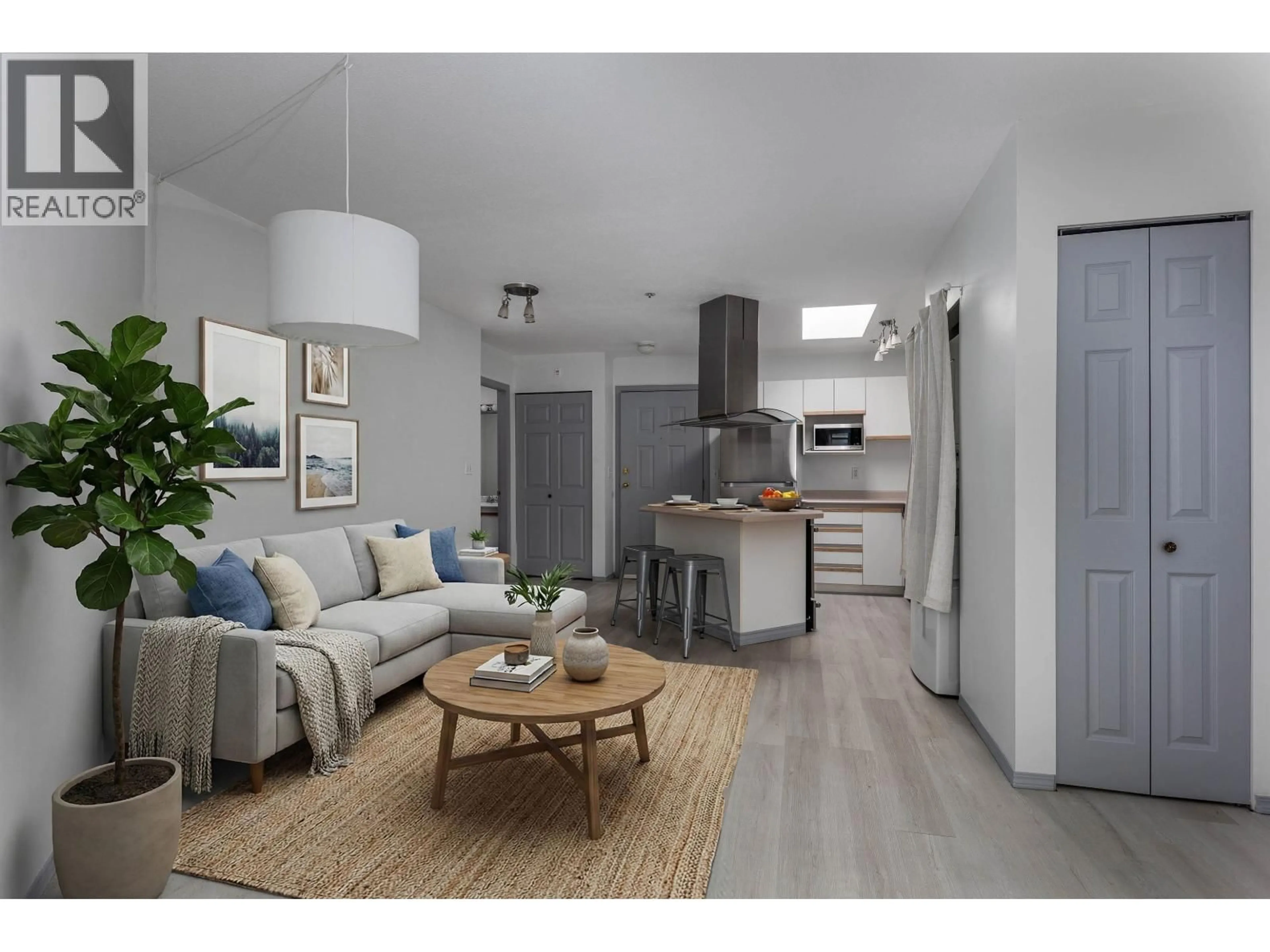 Open concept kitchen, wood/laminate floor for E309 - 40180 WILLOW CRESCENT, Squamish British Columbia V8B0M3