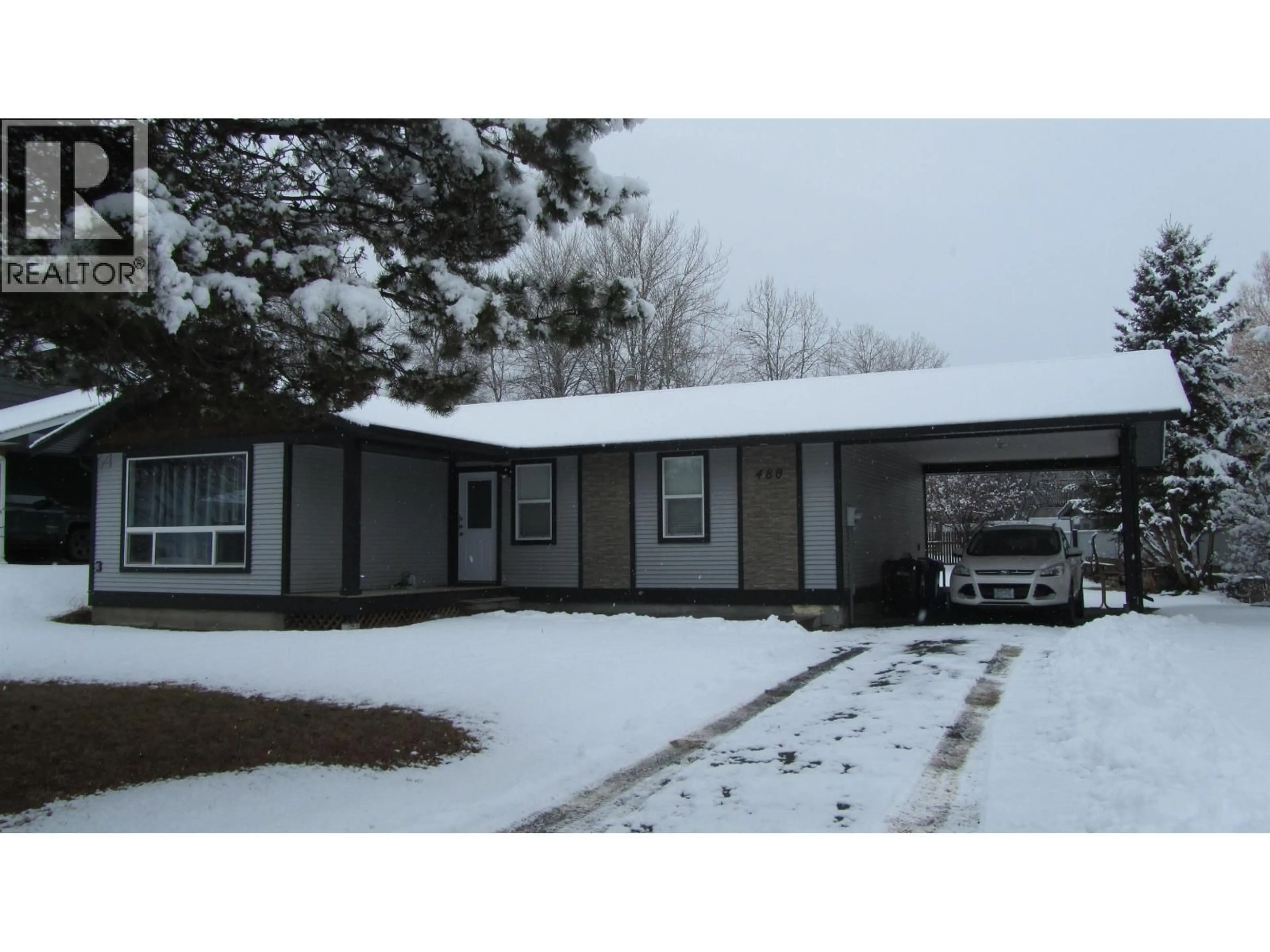 Home with vinyl exterior material, street for 488 EVERGREEN CRESCENT, 100 Mile House British Columbia V0K2E0