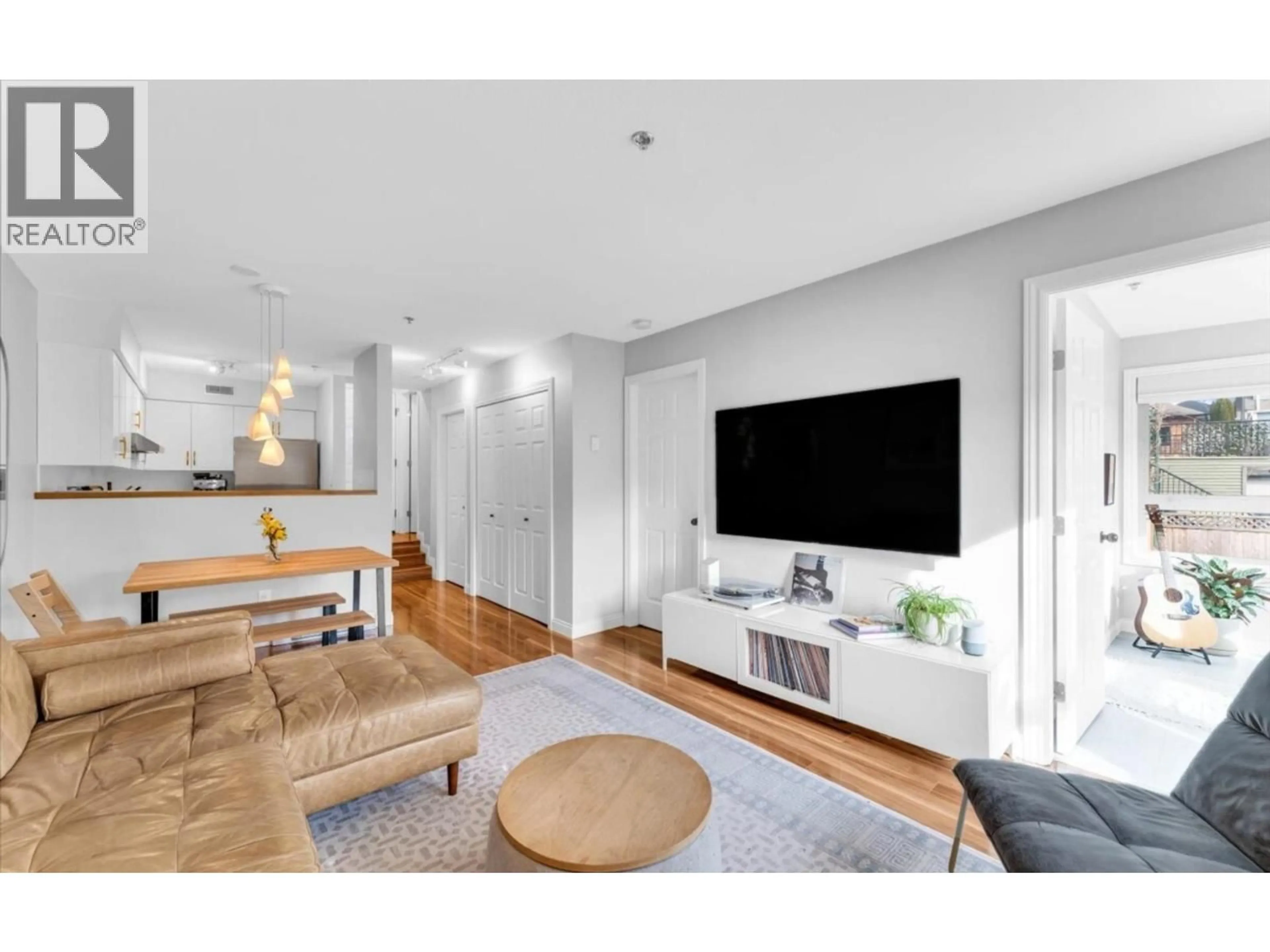 Living room with furniture, wood/laminate floor for 208 - 1516 1ST AVENUE, Vancouver British Columbia V5N1A5