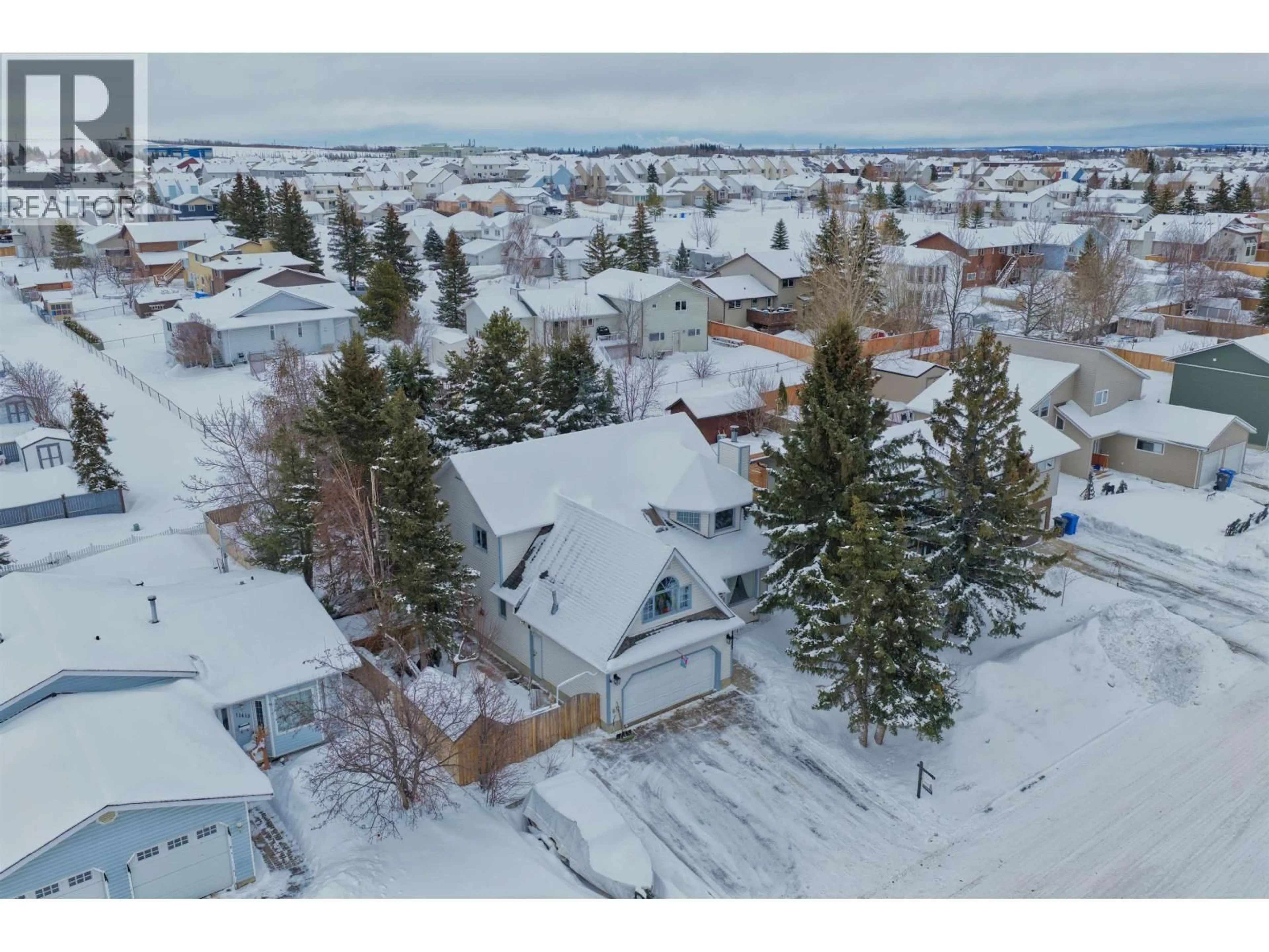 A pic from outside/outdoor area/front of a property/back of a property/a pic from drone, street for 11415 92 STREET, Fort St. John British Columbia V1J5E8