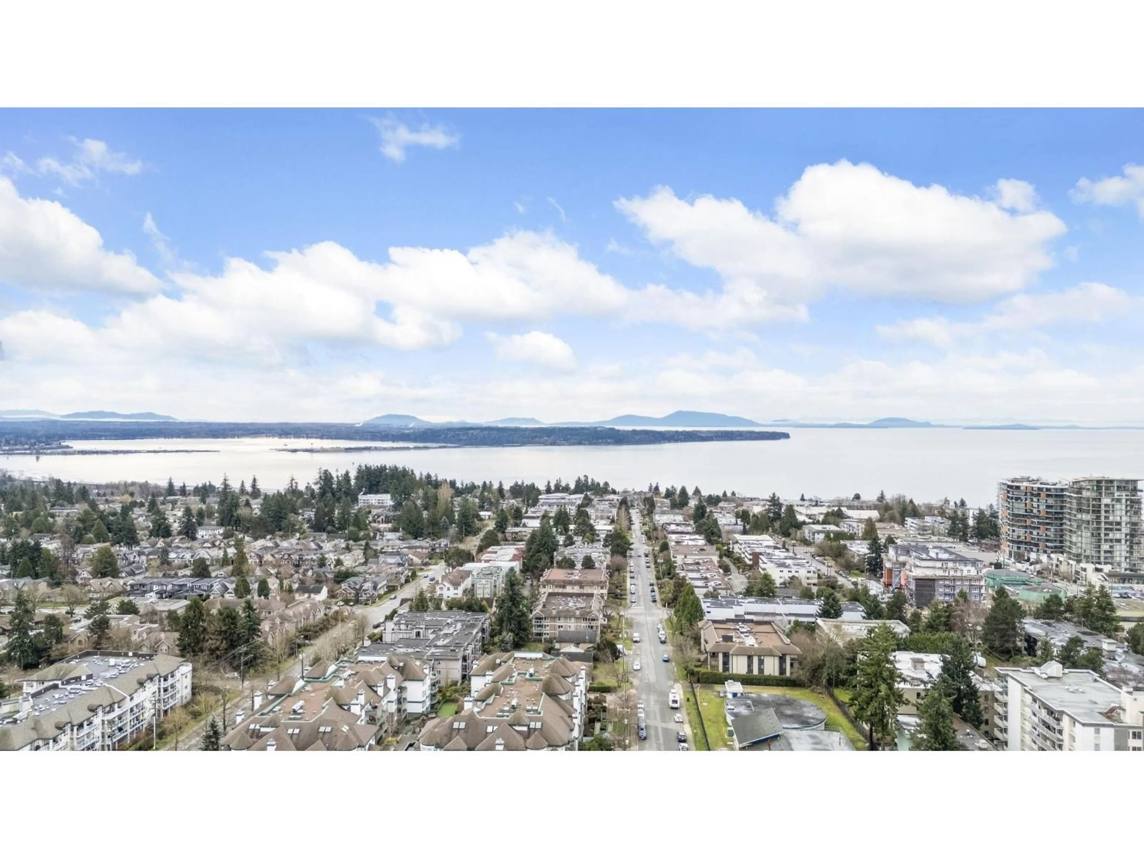 A pic from outside/outdoor area/front of a property/back of a property/a pic from drone, water/lake/river/ocean view for 106 - 15353 17 AVENUE, Surrey British Columbia V4A1T8