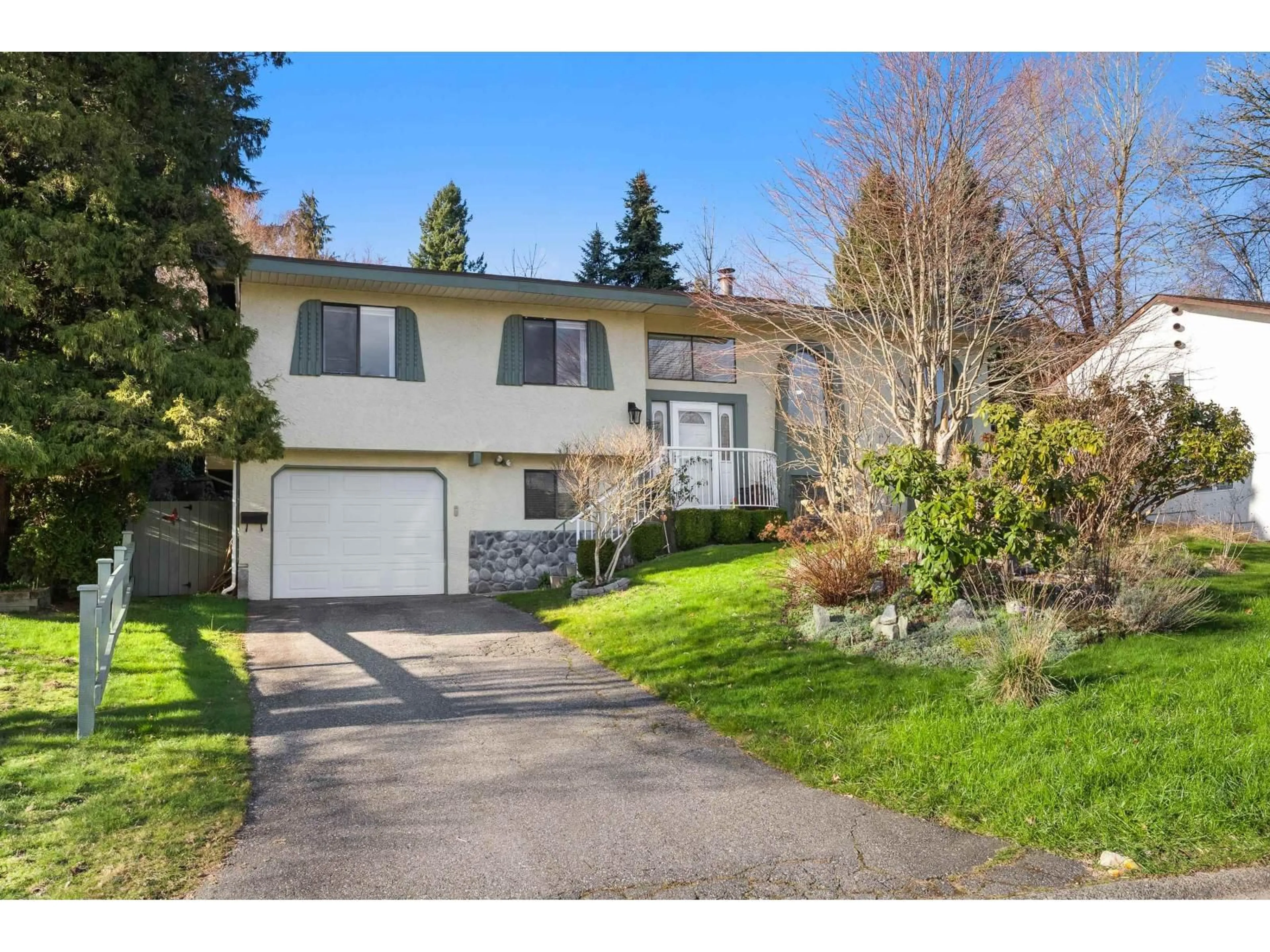 Home with vinyl exterior material, street for 8317 BLUEBERRY DRIVE, Mission British Columbia V2V5W4