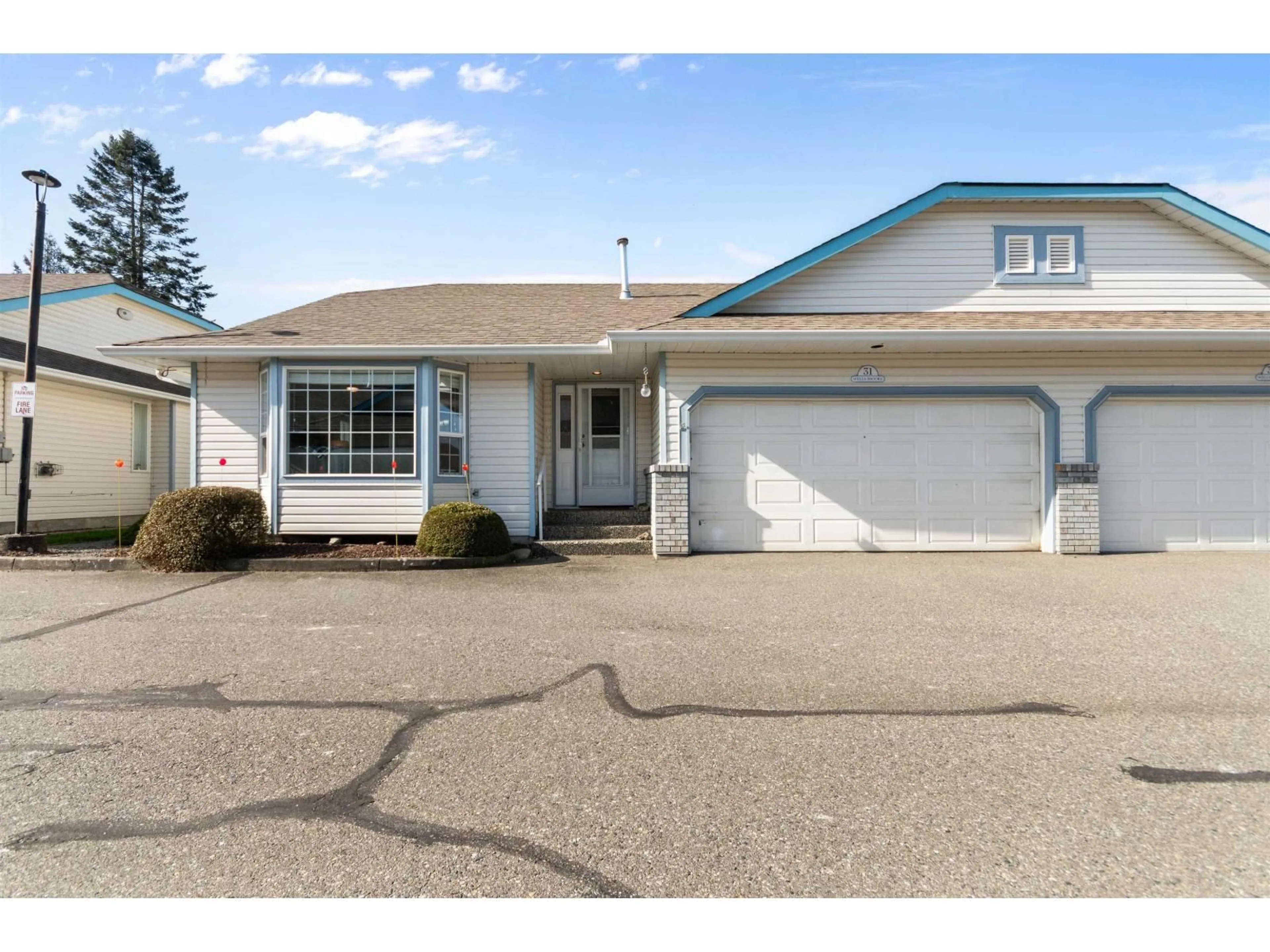 Home with vinyl exterior material, street for 31 - 45175 WELLS ROAD, Chilliwack British Columbia V2R3K7