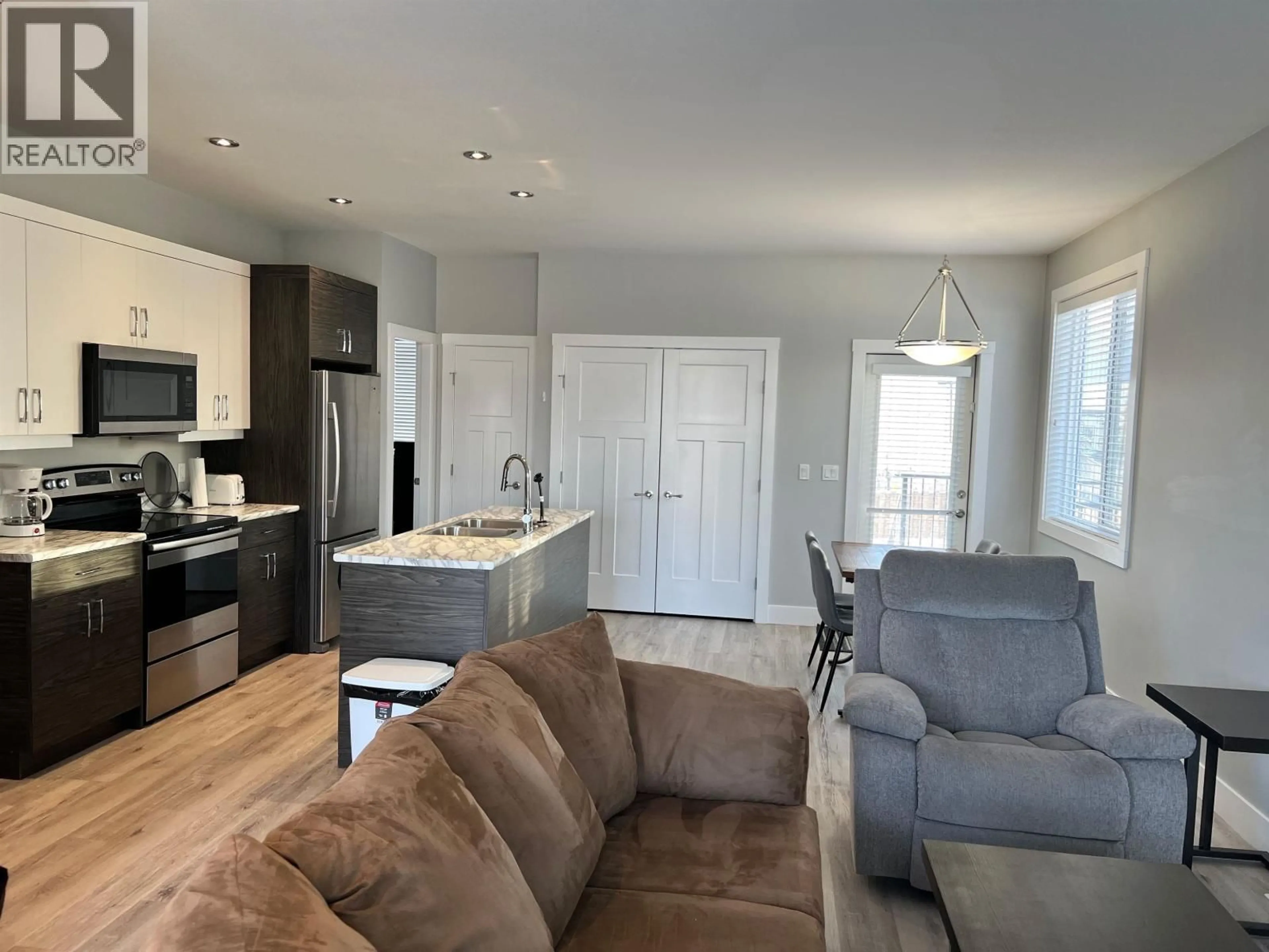 Open concept kitchen, unknown for 8424 88 AVENUE, Fort St. John British Columbia V1J0S2