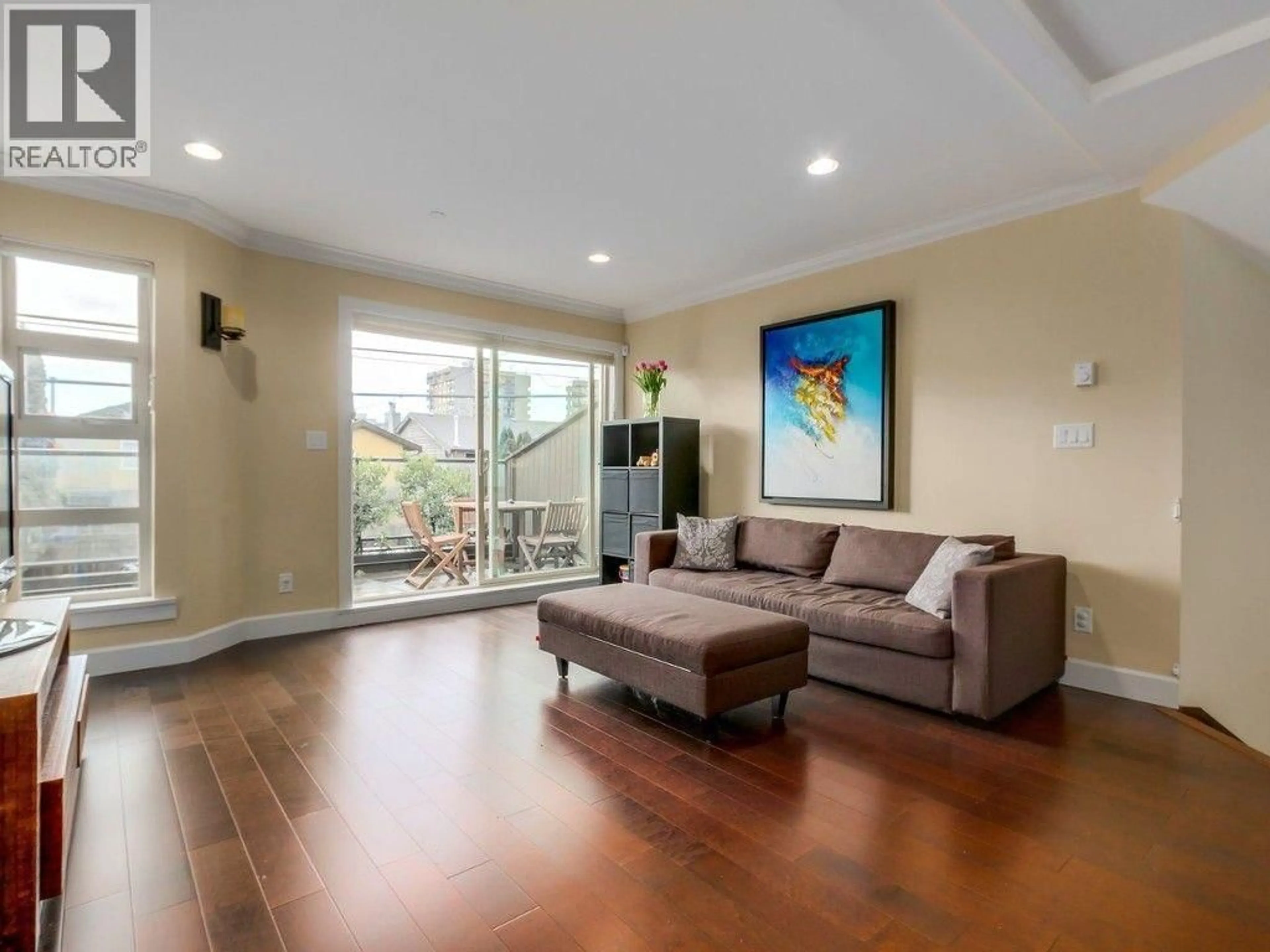 Living room with furniture, wood/laminate floor for 7 - 215 4 STREET, North Vancouver British Columbia V7L1J1