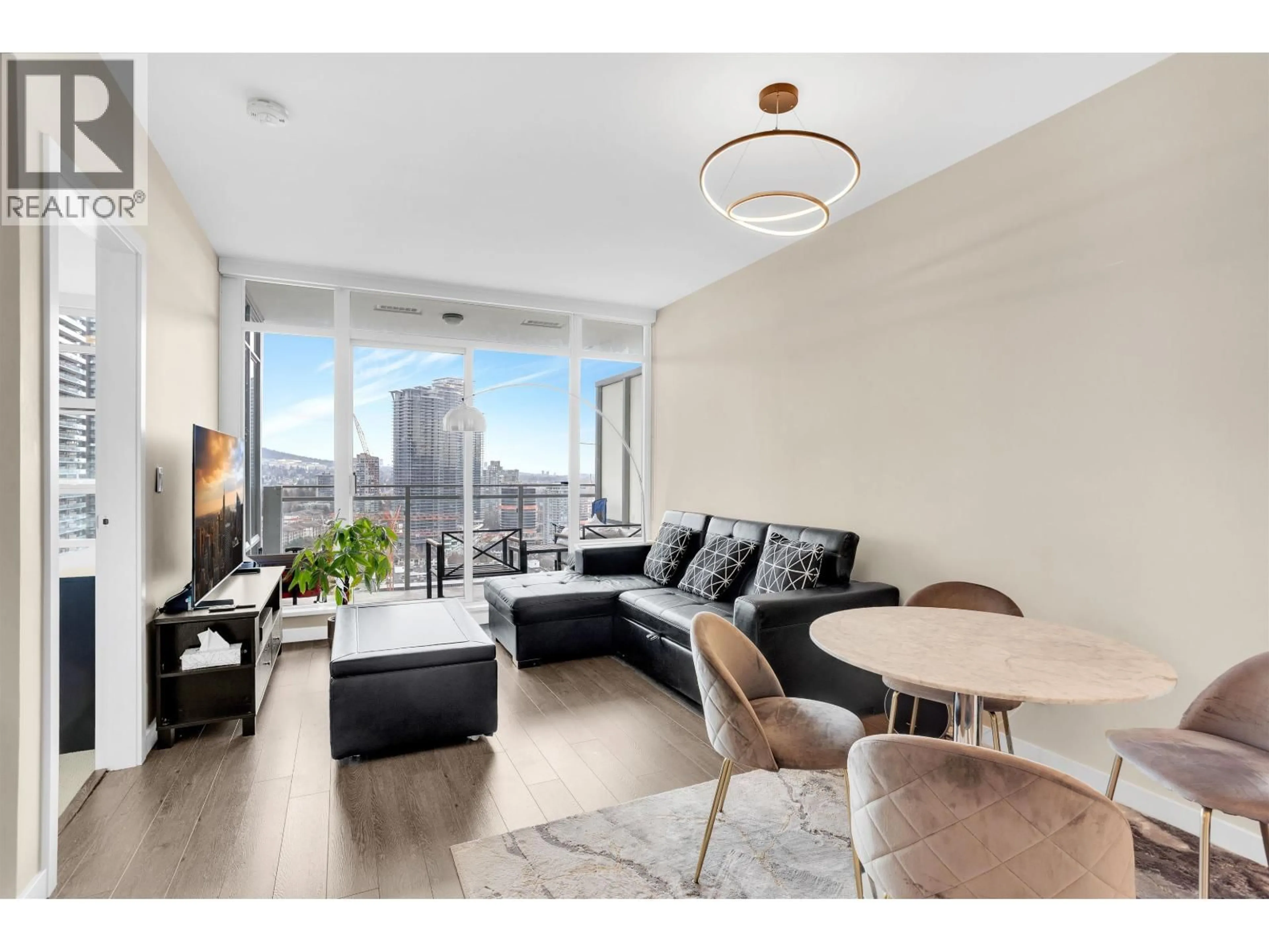Living room with furniture, wood/laminate floor for 1807 - 4485 SKYLINE DRIVE, Burnaby British Columbia V5C0J2