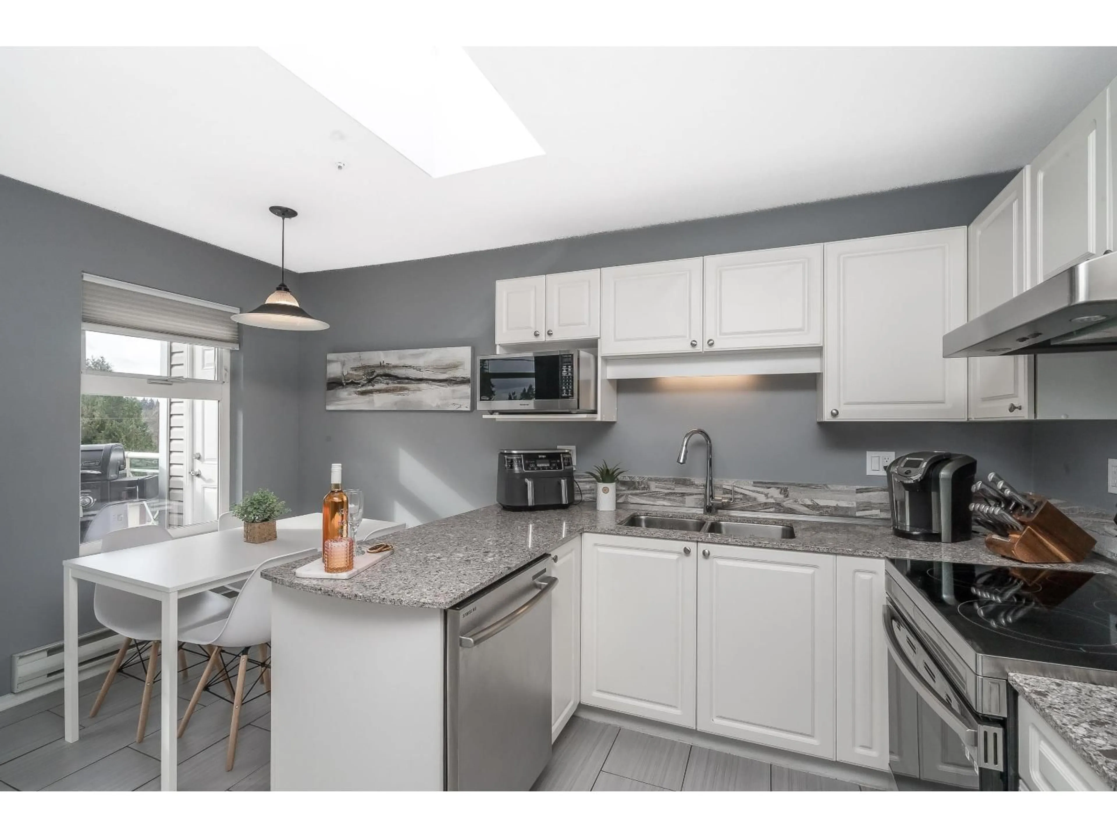 Standard kitchen, ceramic/tile floor for 409 - 20245 53 AVENUE, Langley British Columbia V3A3V2