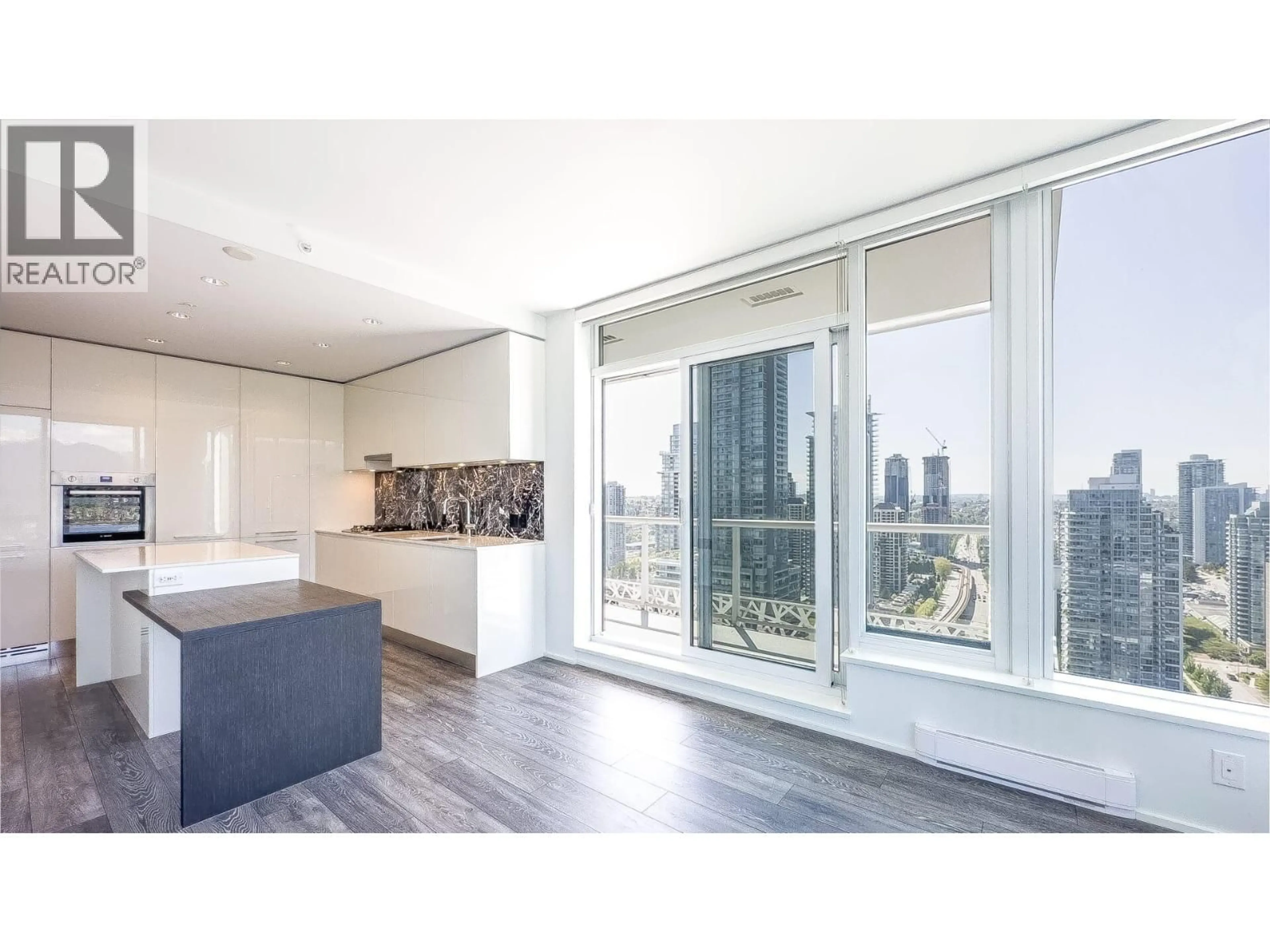 Open concept kitchen, wood/laminate floor for 2609 - 1955 ALPHA WAY, Burnaby British Columbia V5C0K6