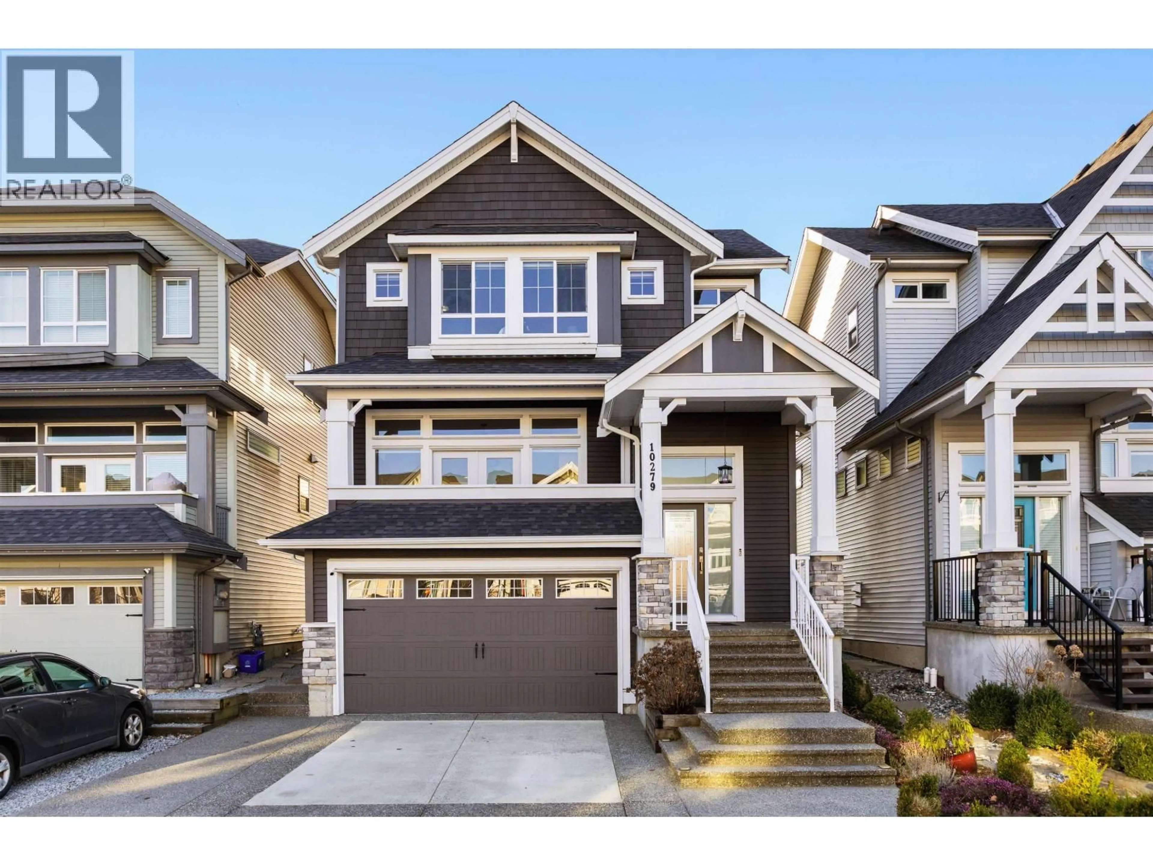 Home with vinyl exterior material, street for 10279 238A STREET, Maple Ridge British Columbia V2W1G3